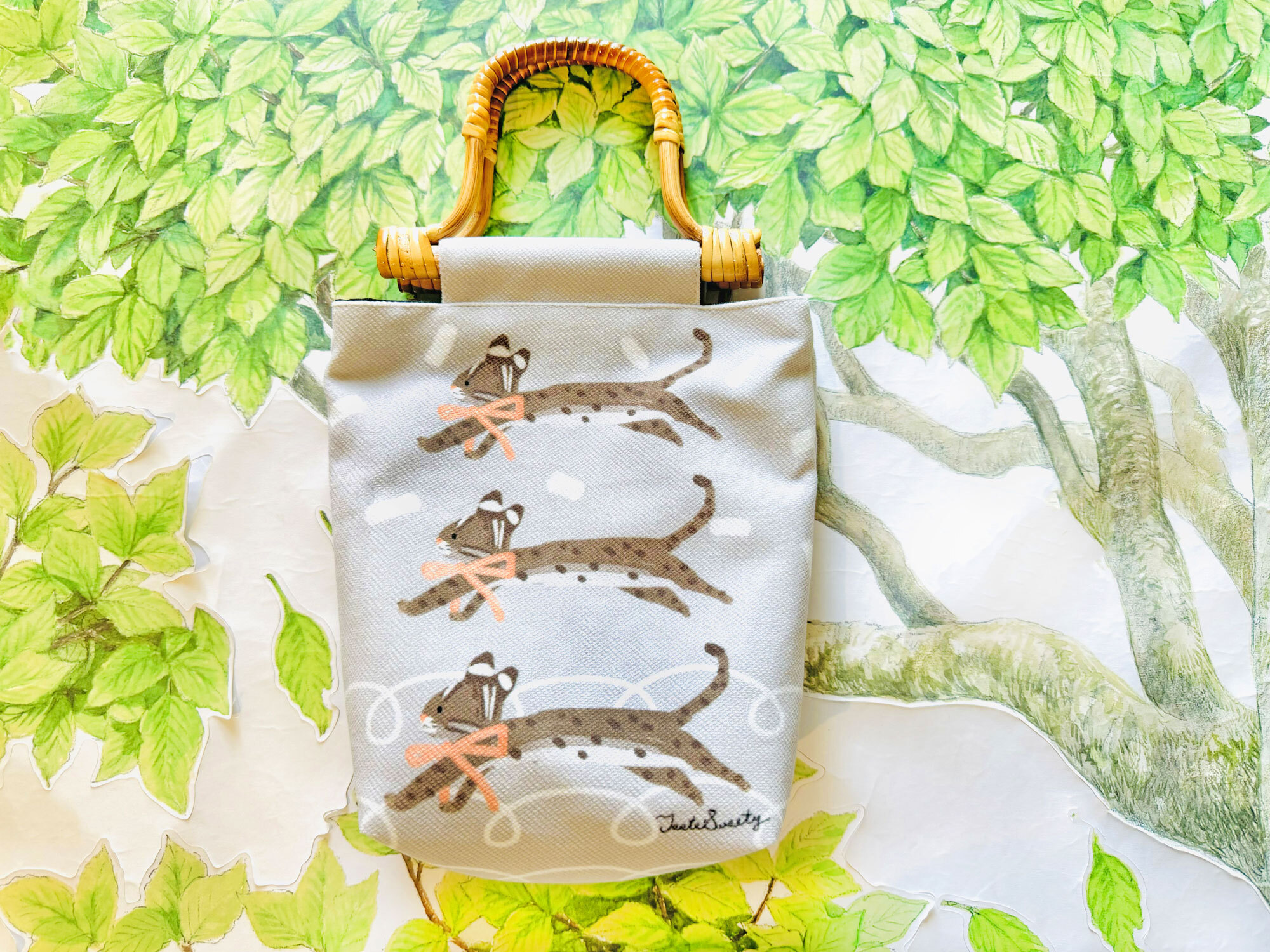 跳跳石虎竹藤提把帆布手提包