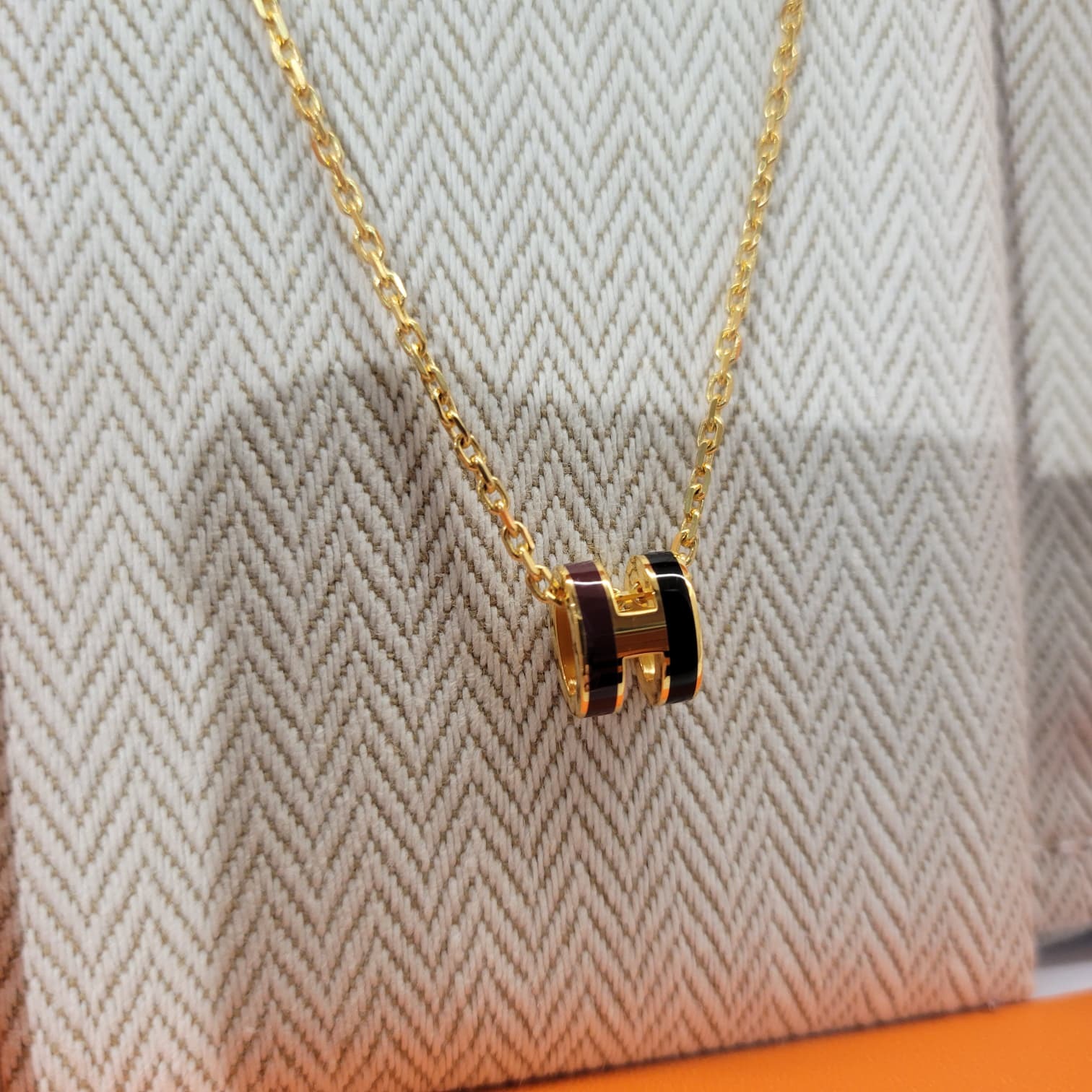 HERMES MINI POP H PENDANT GALAXIE F (2 TONE) 55愛馬仕紅 / 黑色 拼金