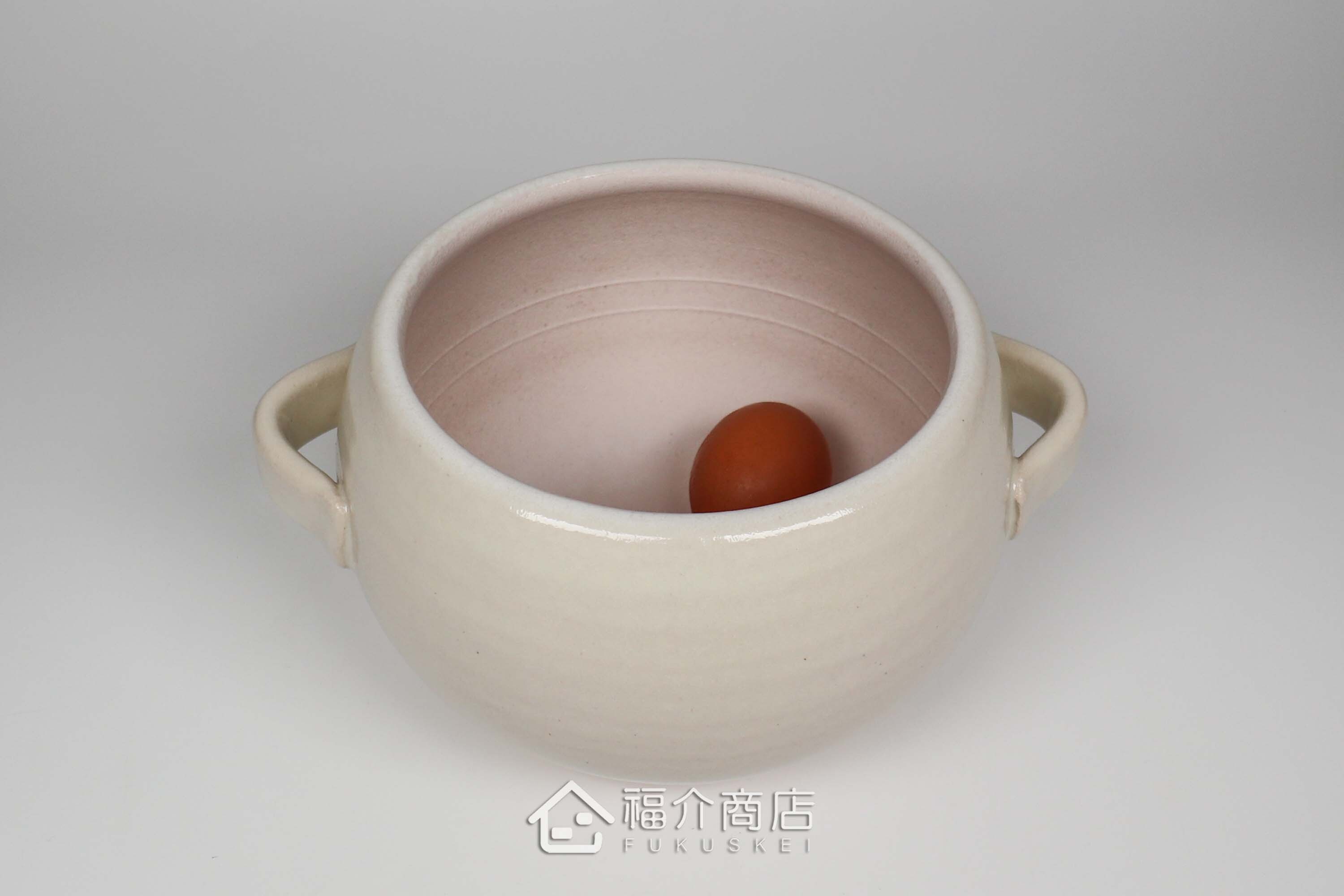 煮飯用陶瓷材質的飯鍋與土雞蛋