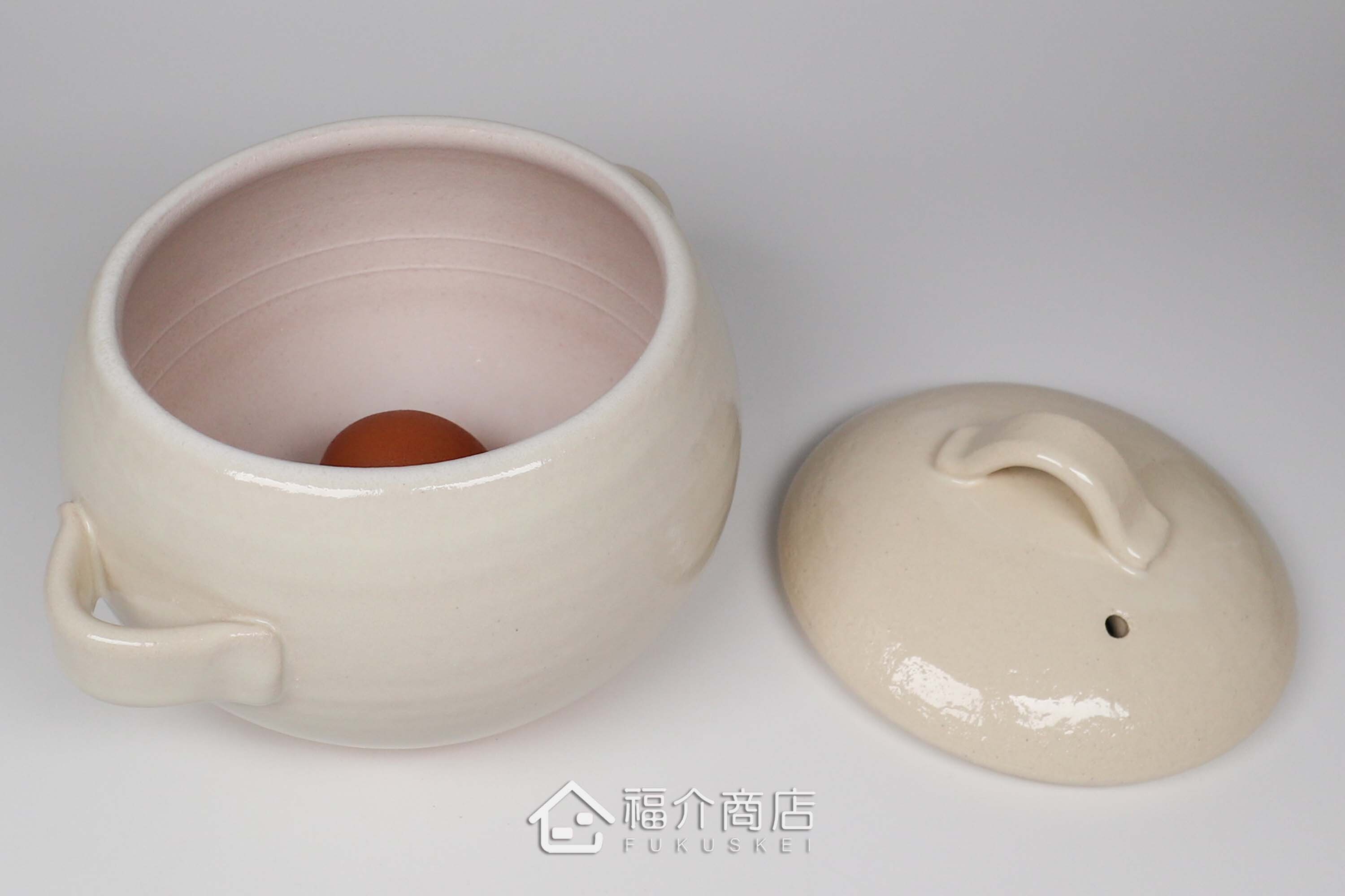 煮飯用陶瓷材質的飯鍋與土雞蛋