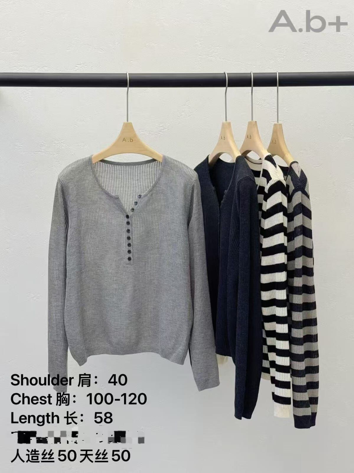 ABB5085 排扣坑紋針織上衣