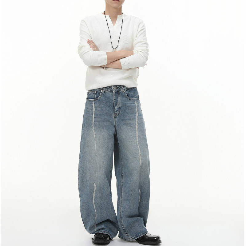 設計感線條車線微彎刀牛仔褲