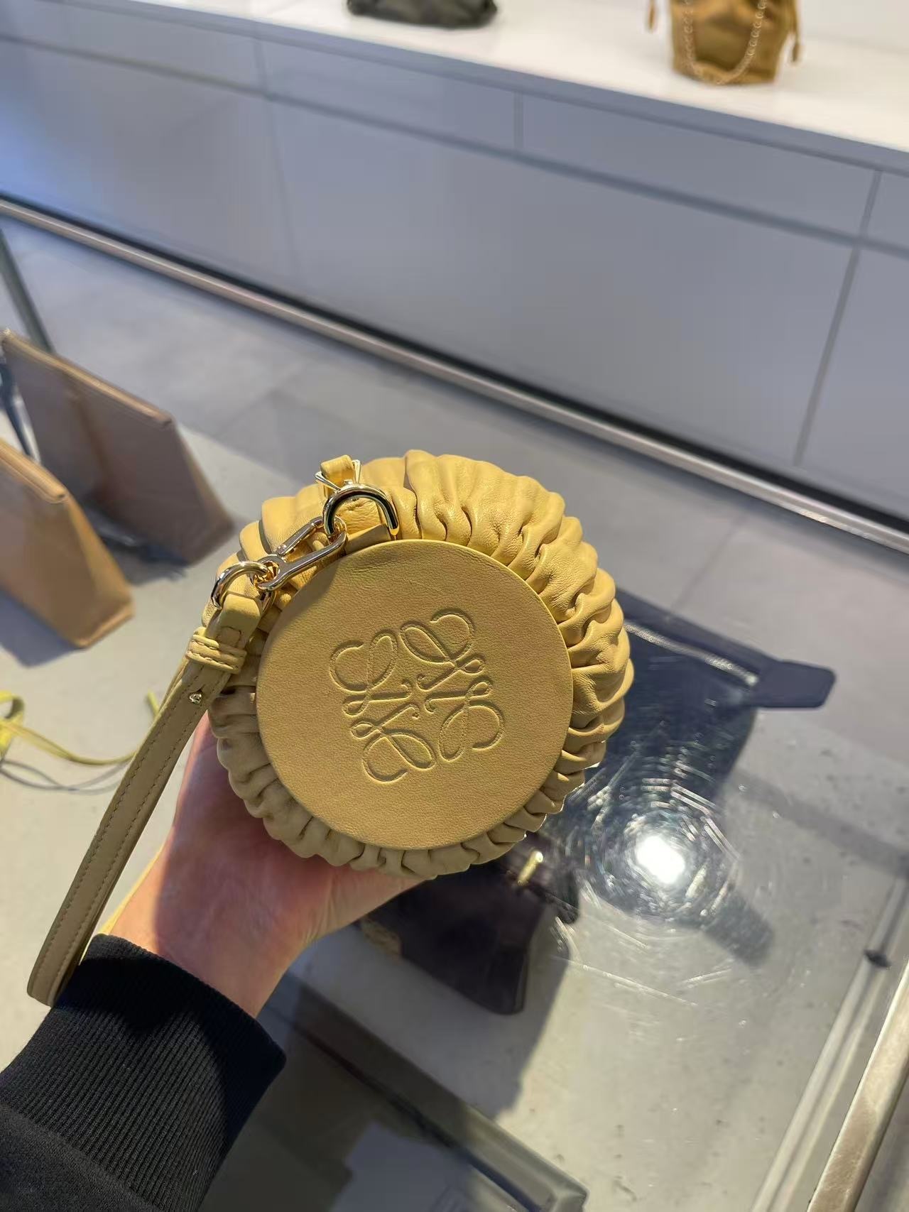 Loewe Bracelet pouch bag Dark butter yellow