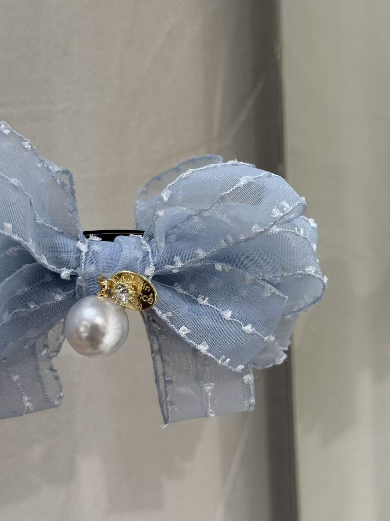 藍色蝴蝶結珍珠蕉夾