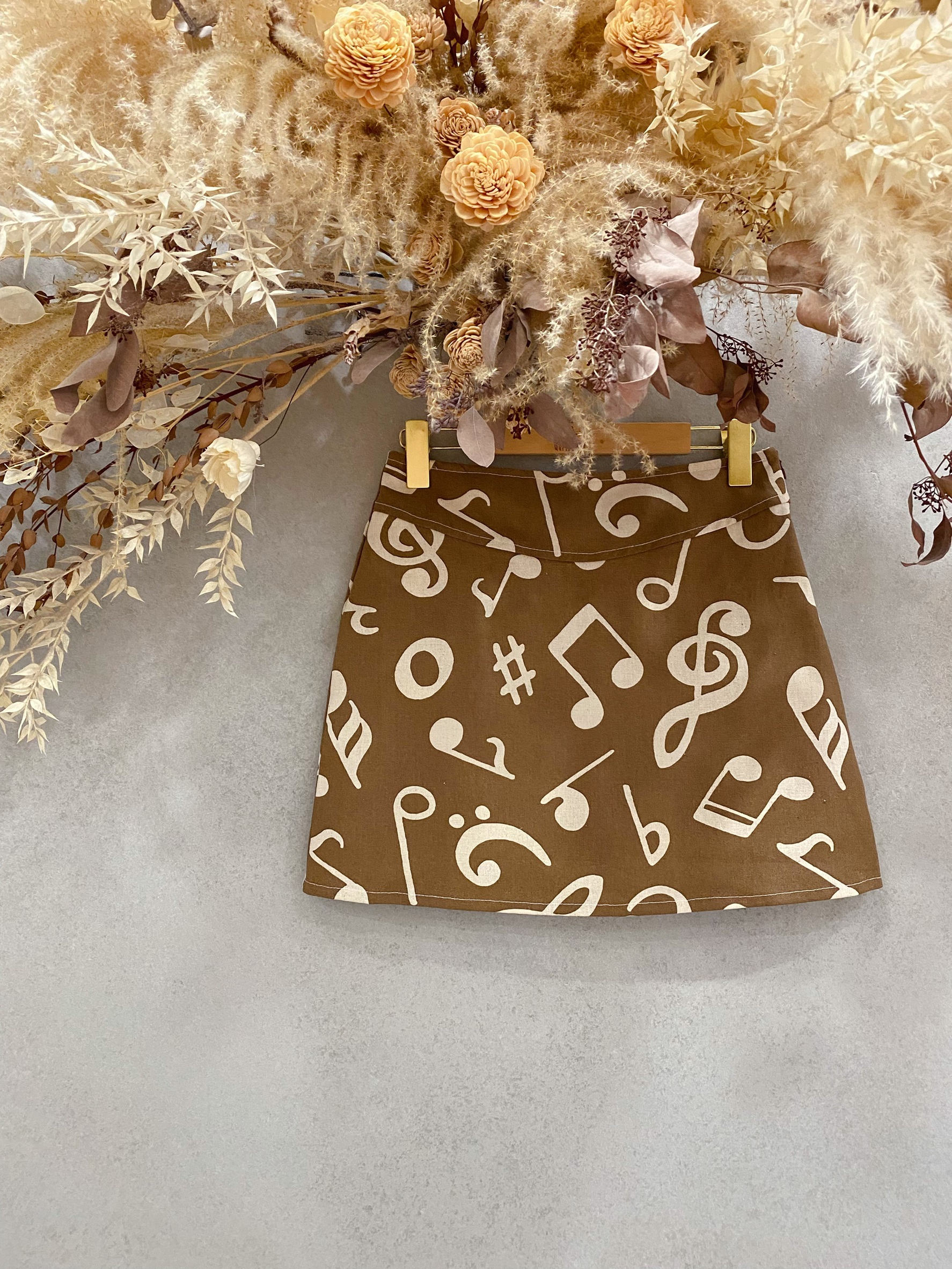 咖啡音符 媽咪側開連褲短裙（XS ）