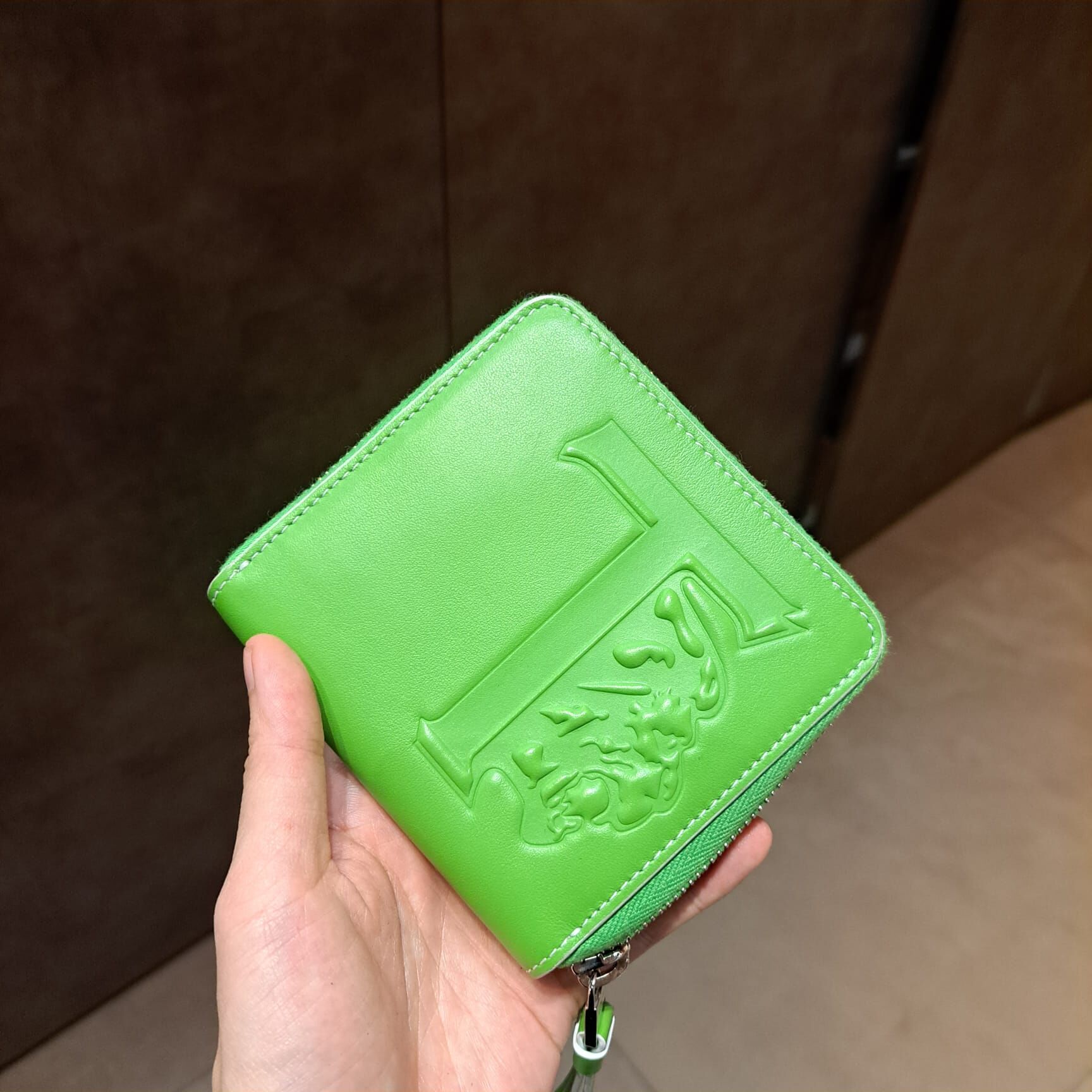 Tods XAUTLEAF embossed zip around small wallet green