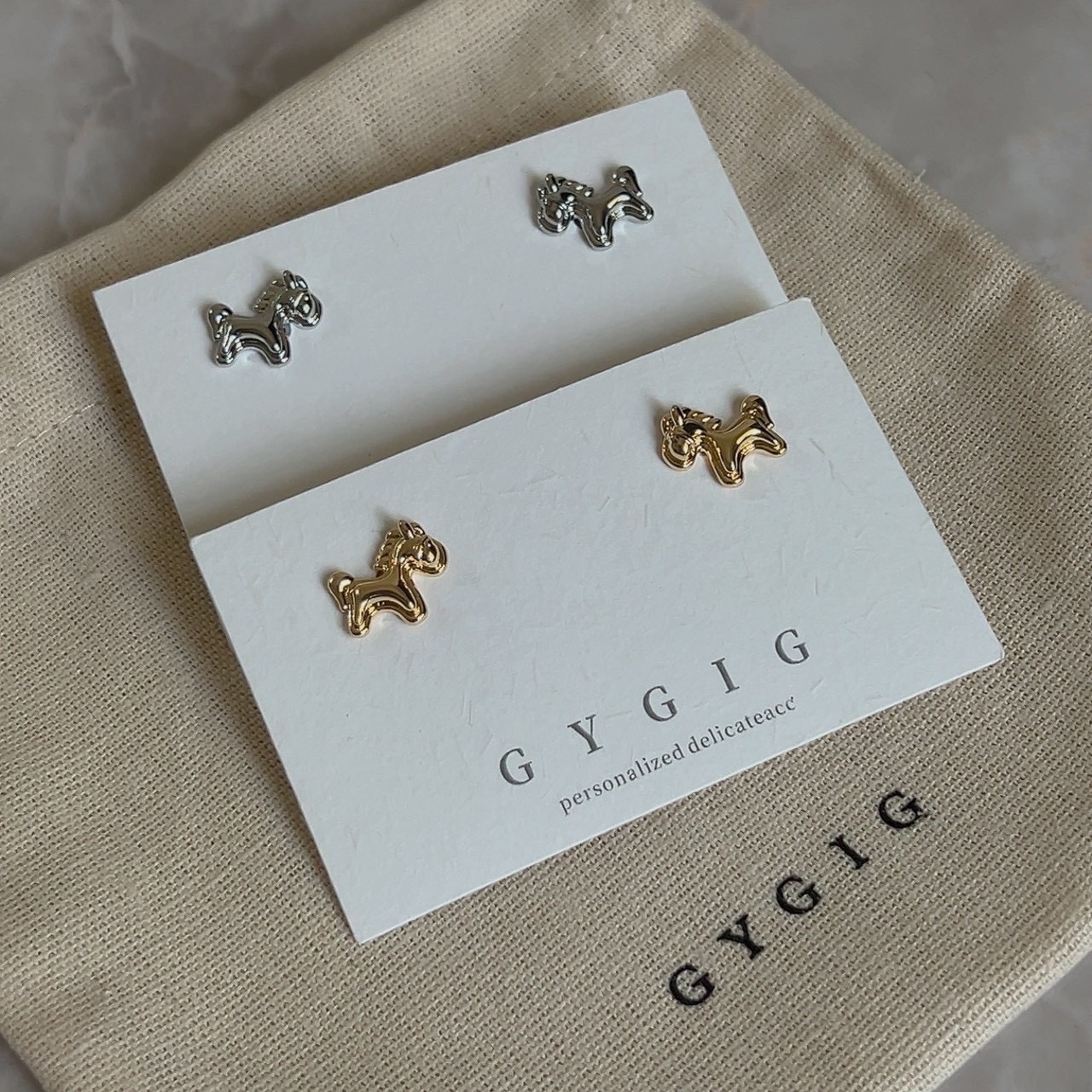 Gy”小馬駒金銀立體耳釘