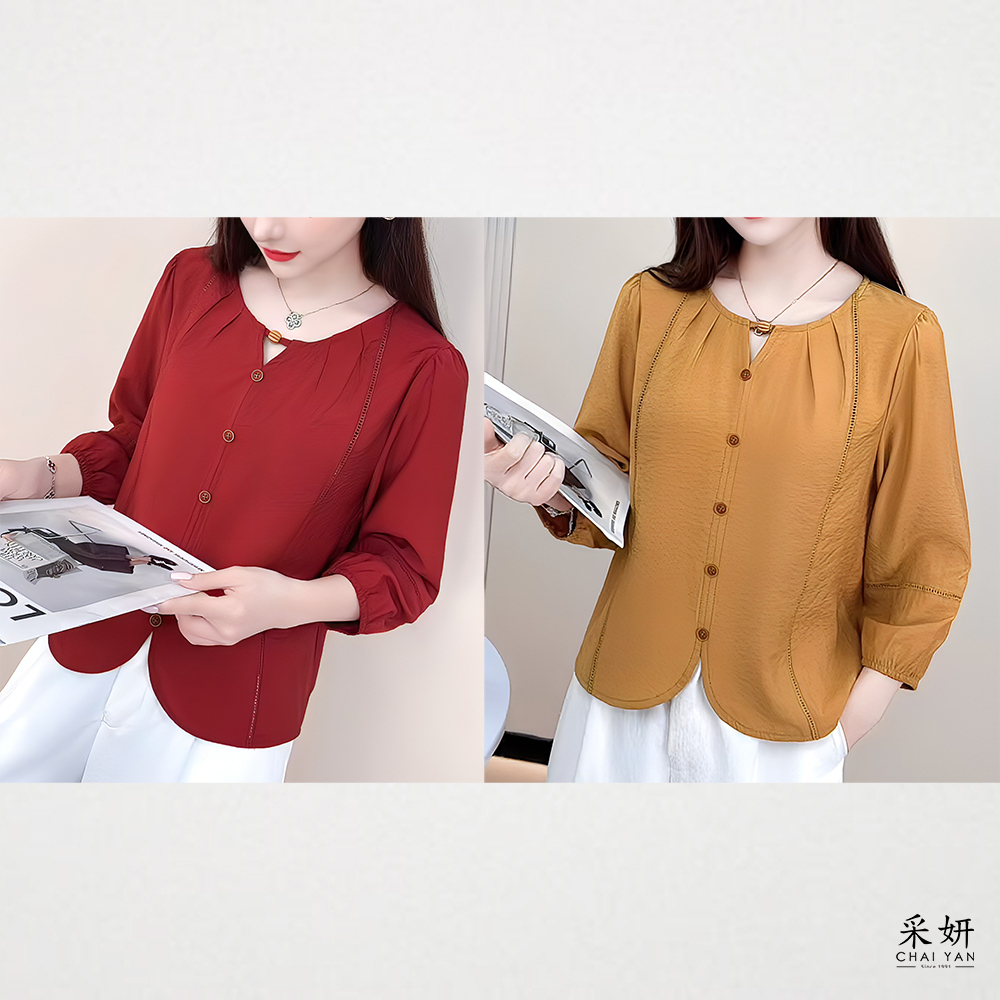 素色假排扣三角鏤空圓領九分袖上衣