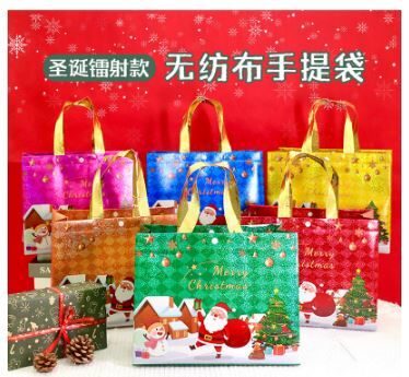 圣诞现货 礼品袋无纺布 手提袋子圣诞包装 镭射款 随机
