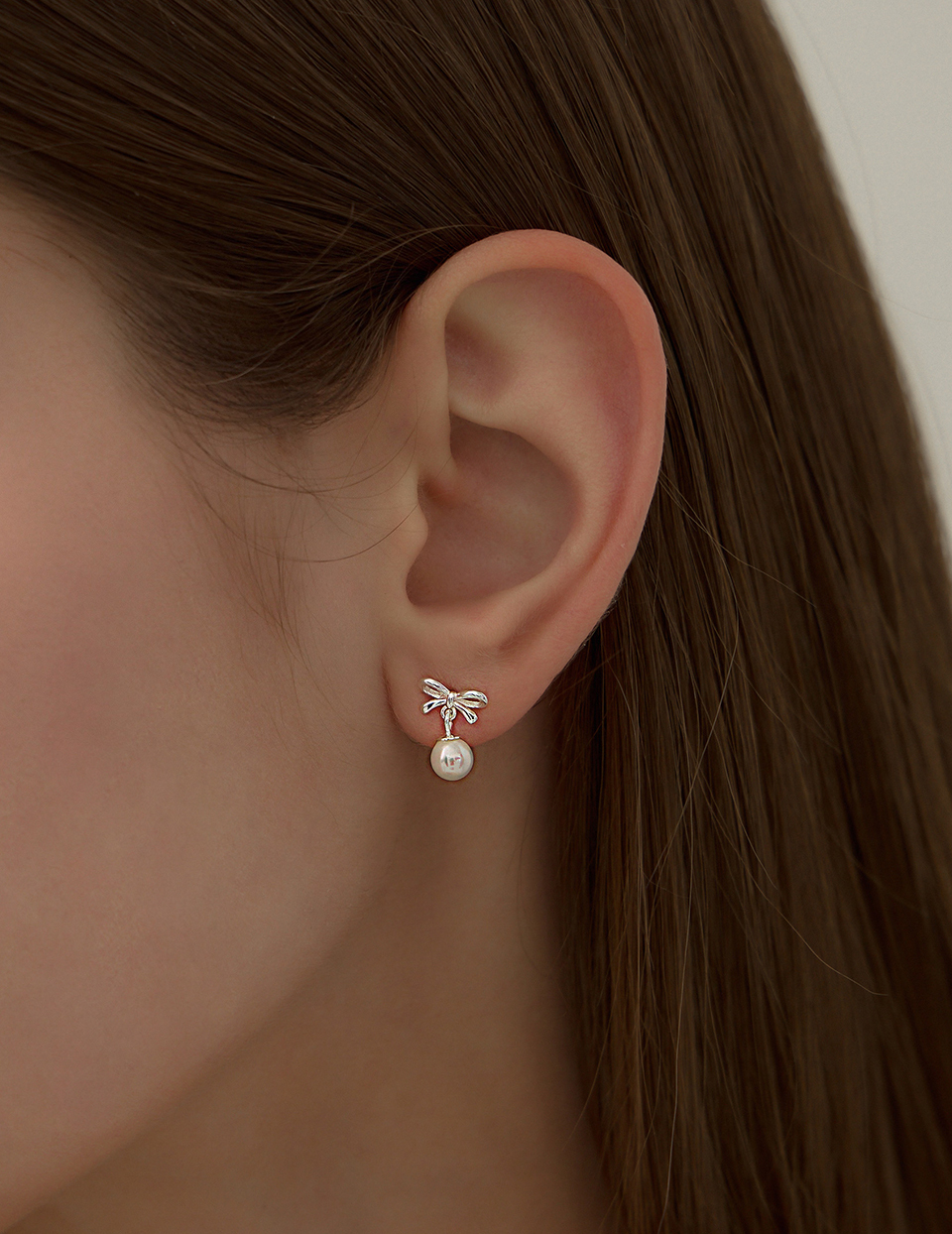 【925純銀】珠光蝴蝶結。針式耳環