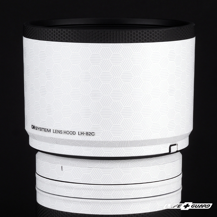 LIFE+GUARD OM SYSTEM ED 50-200mm F2.8 IS PRO 貼膜遮光罩展示圖，LIFE+GUARD 六角光幻白風格設計