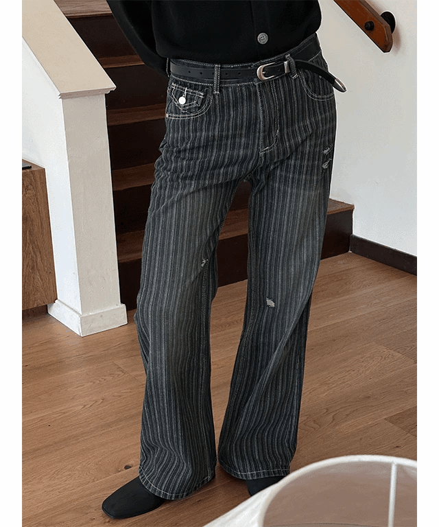 條紋損壞牛仔褲