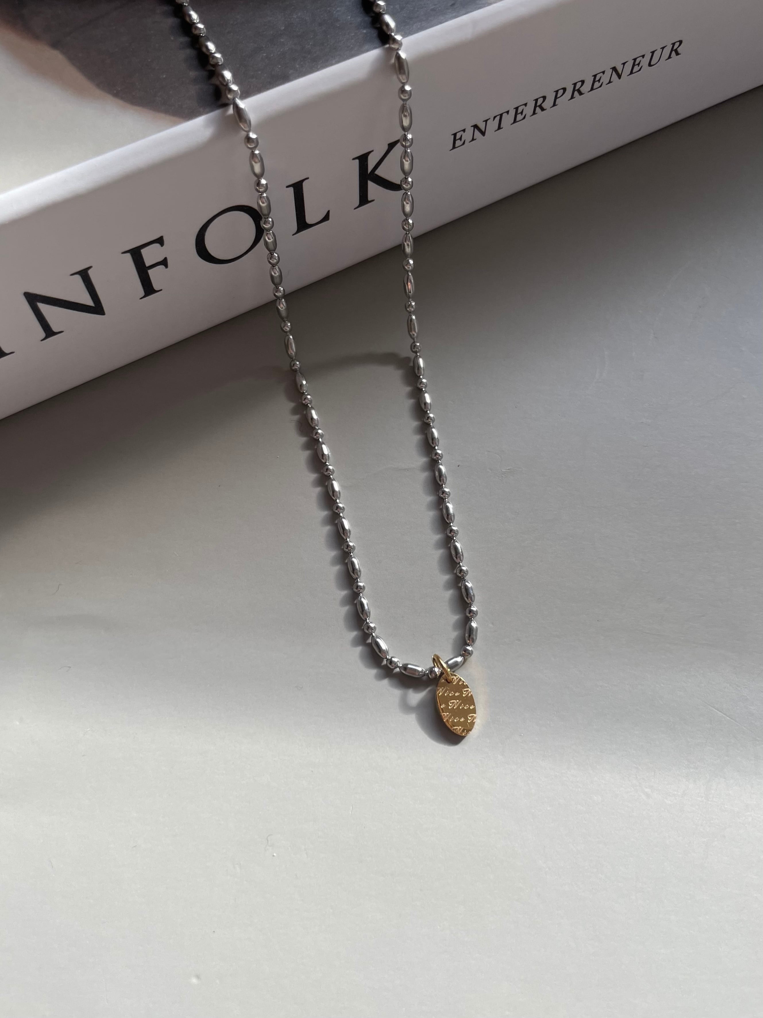 gold oval charm necklace