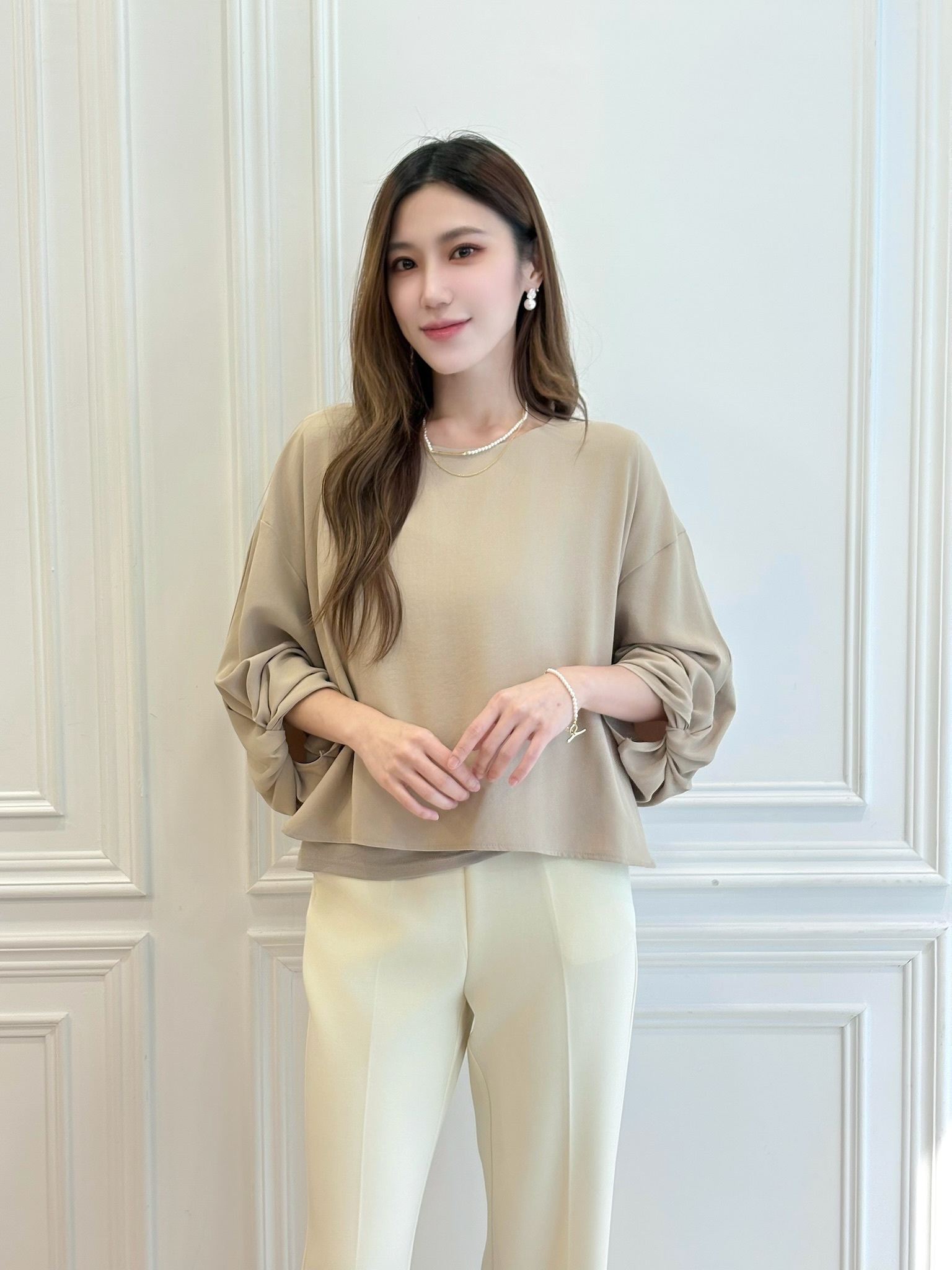 扭結澎袖雙層面料上衣