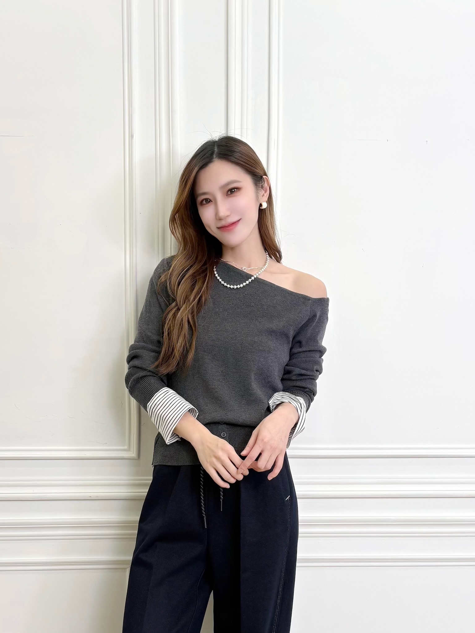 露肩斜領拼接襯衫袖針織上衣