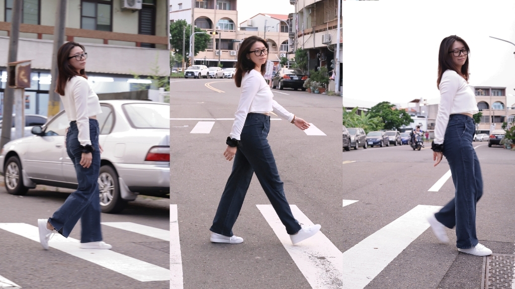 穿著Sanly Joy真皮小白鞋過馬路的畫面，自然光下展現乾淨明亮的鞋面，傳達日常穿搭與潔淨感