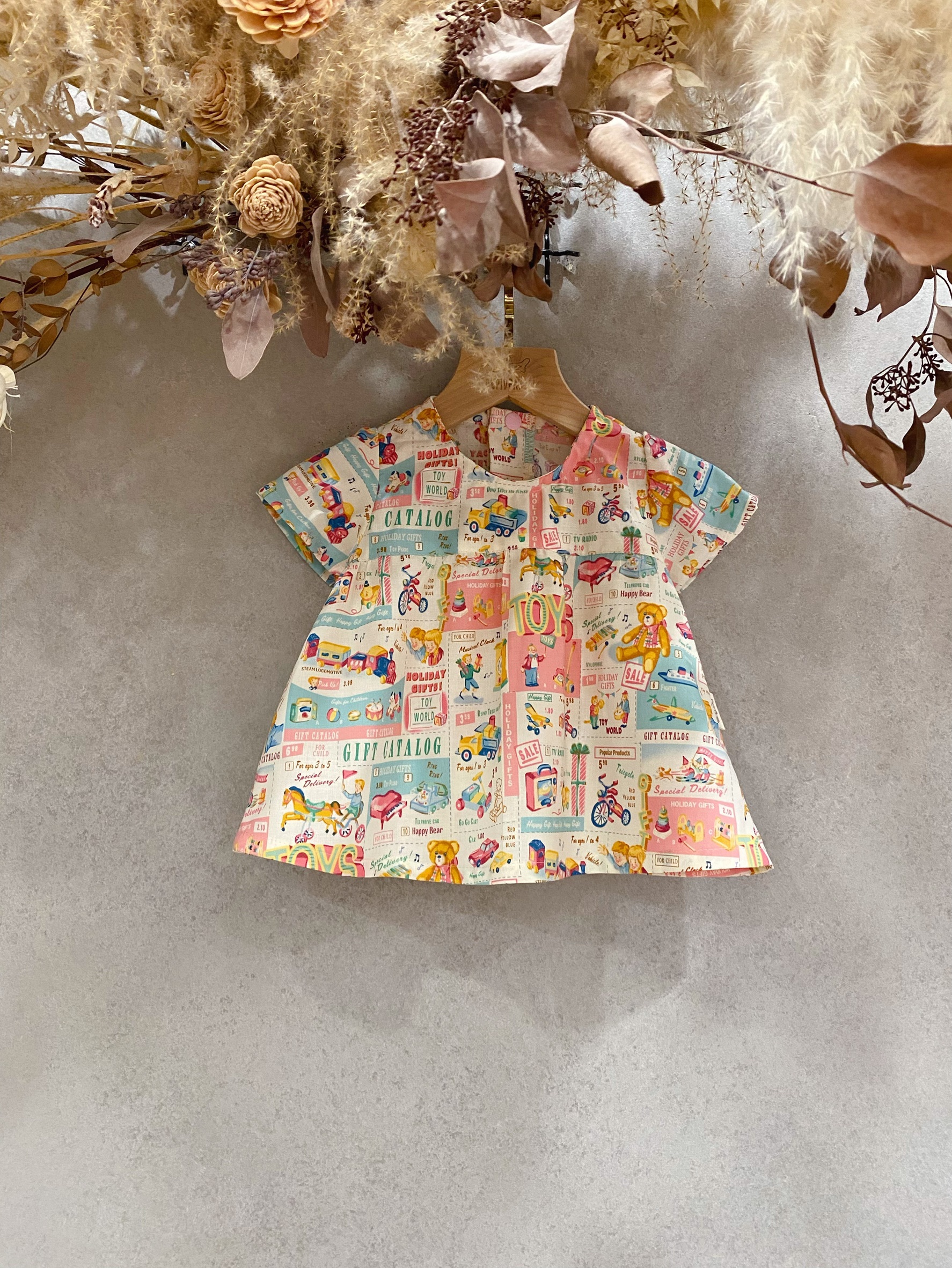 粉美式復古 傘狀短袖上衣(90)