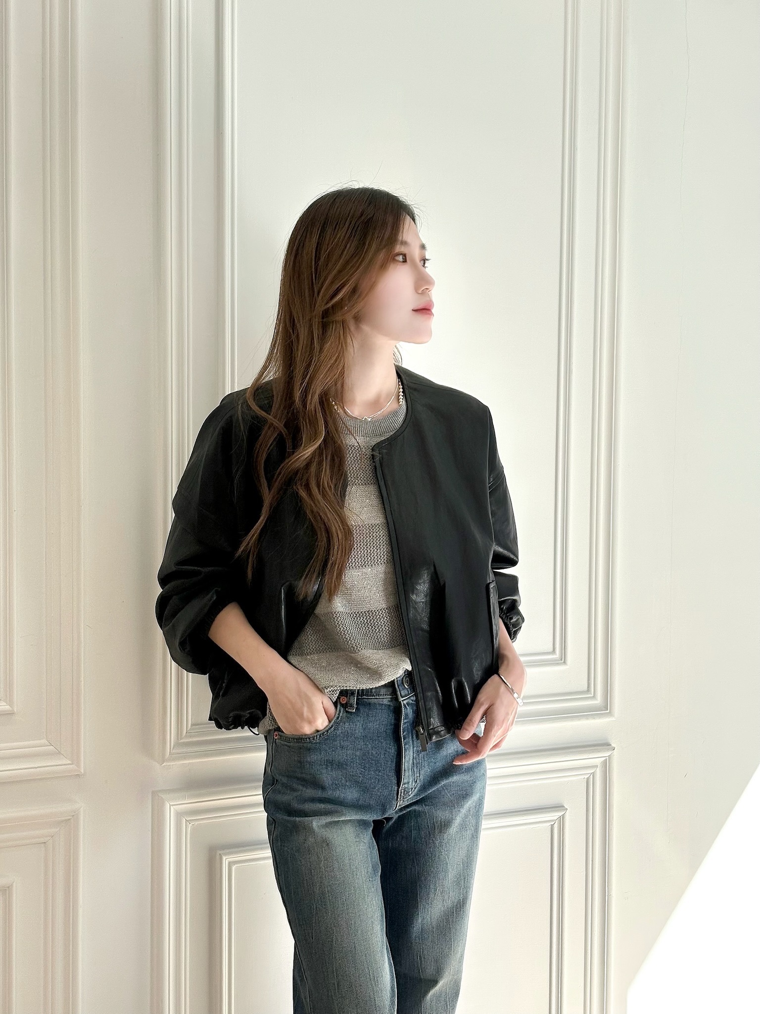 (時髦必備)下擺收腰皮外套