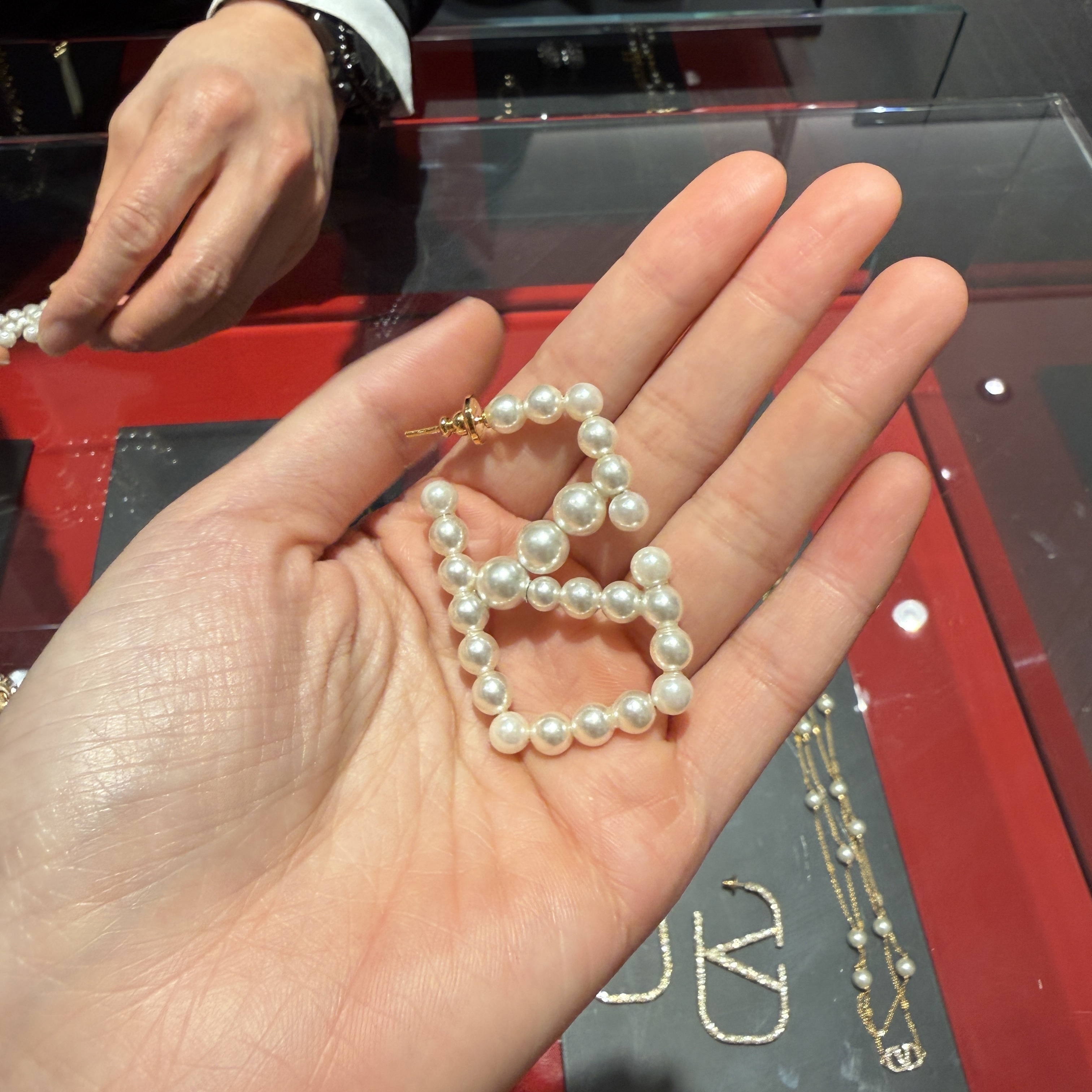 Valentino Vlogo Signature Metal and resin pearls