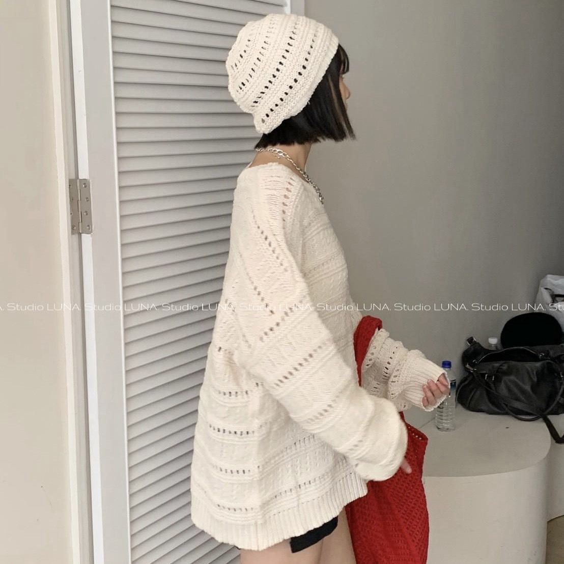 附毛帽洞洞長板針織