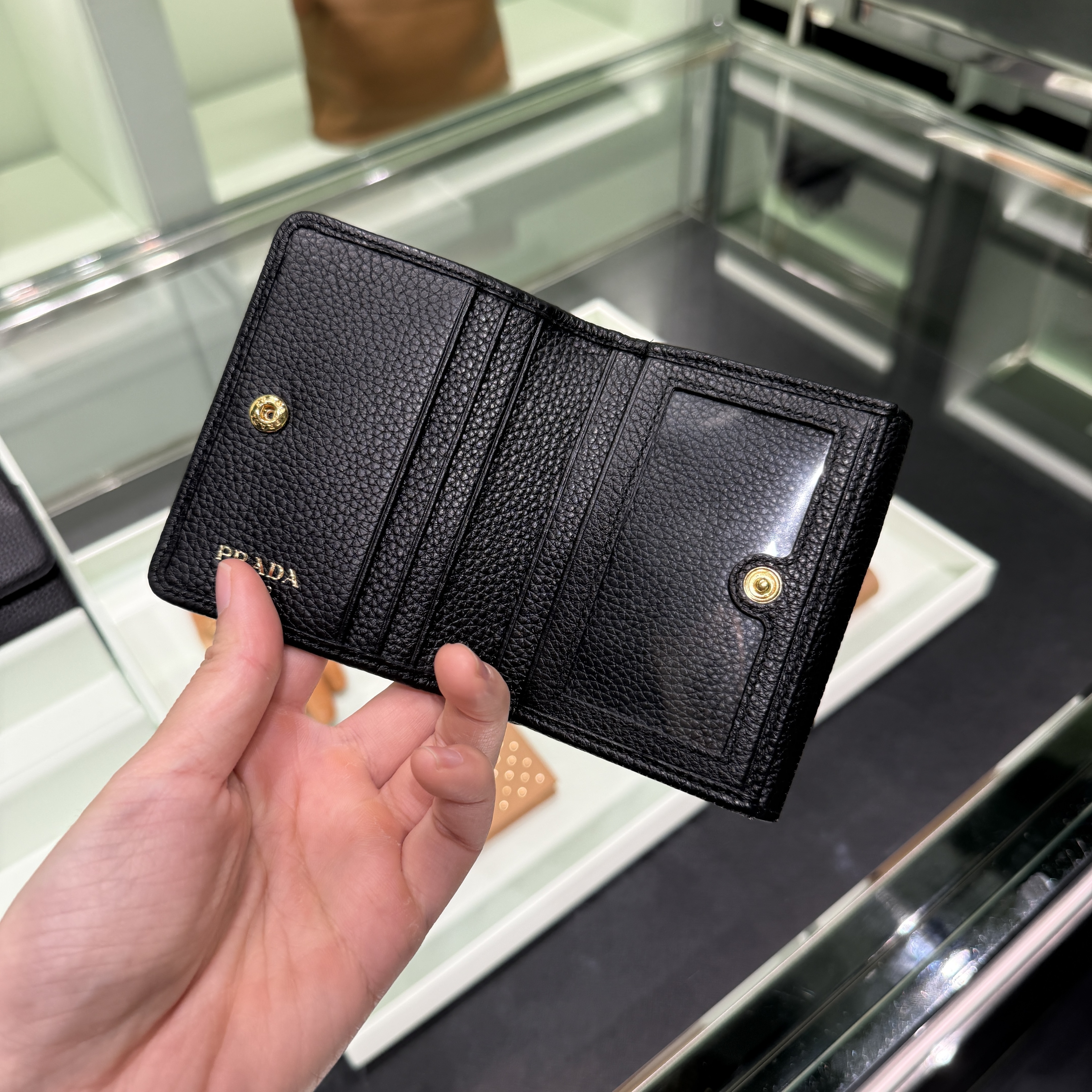 Prada grainy ID slot bi-fold wallet black 1MH350
