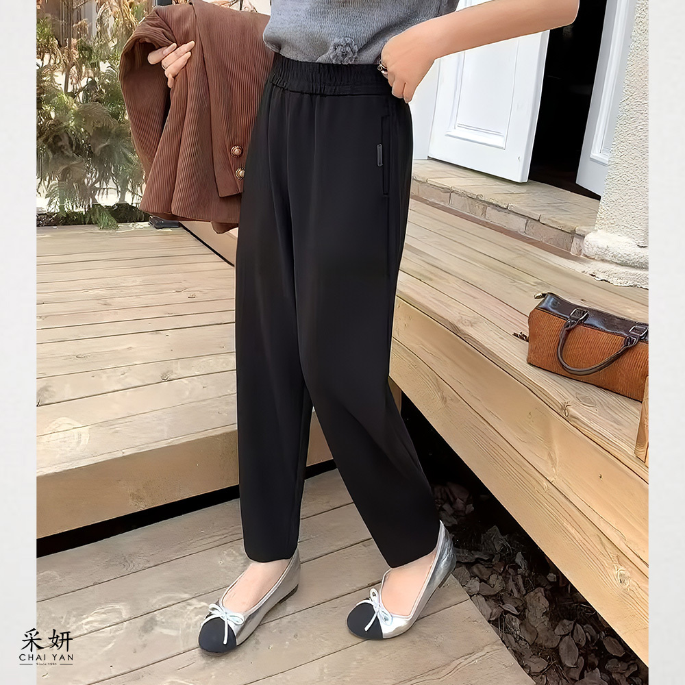 口袋皮標鬆緊腰休閒窄管長褲