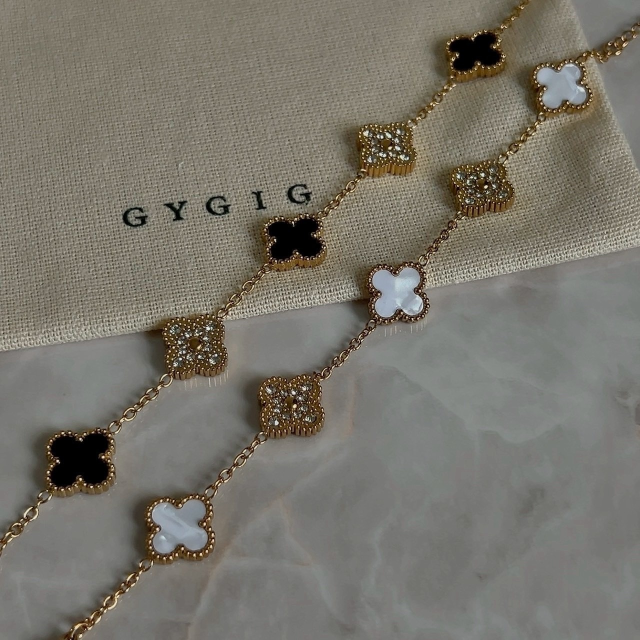 低奢金黑釉/白貝滿天星”k18中號五花四葉草手鍊