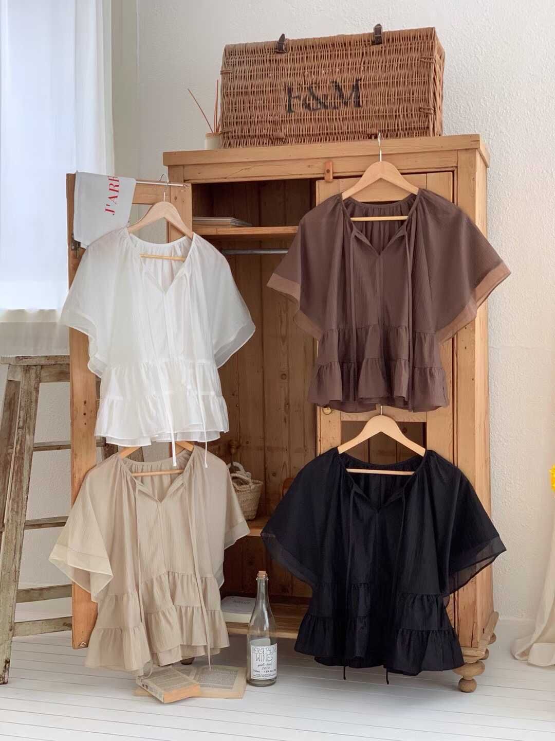 GI5144 蛋糕裙襬綁繩上衣