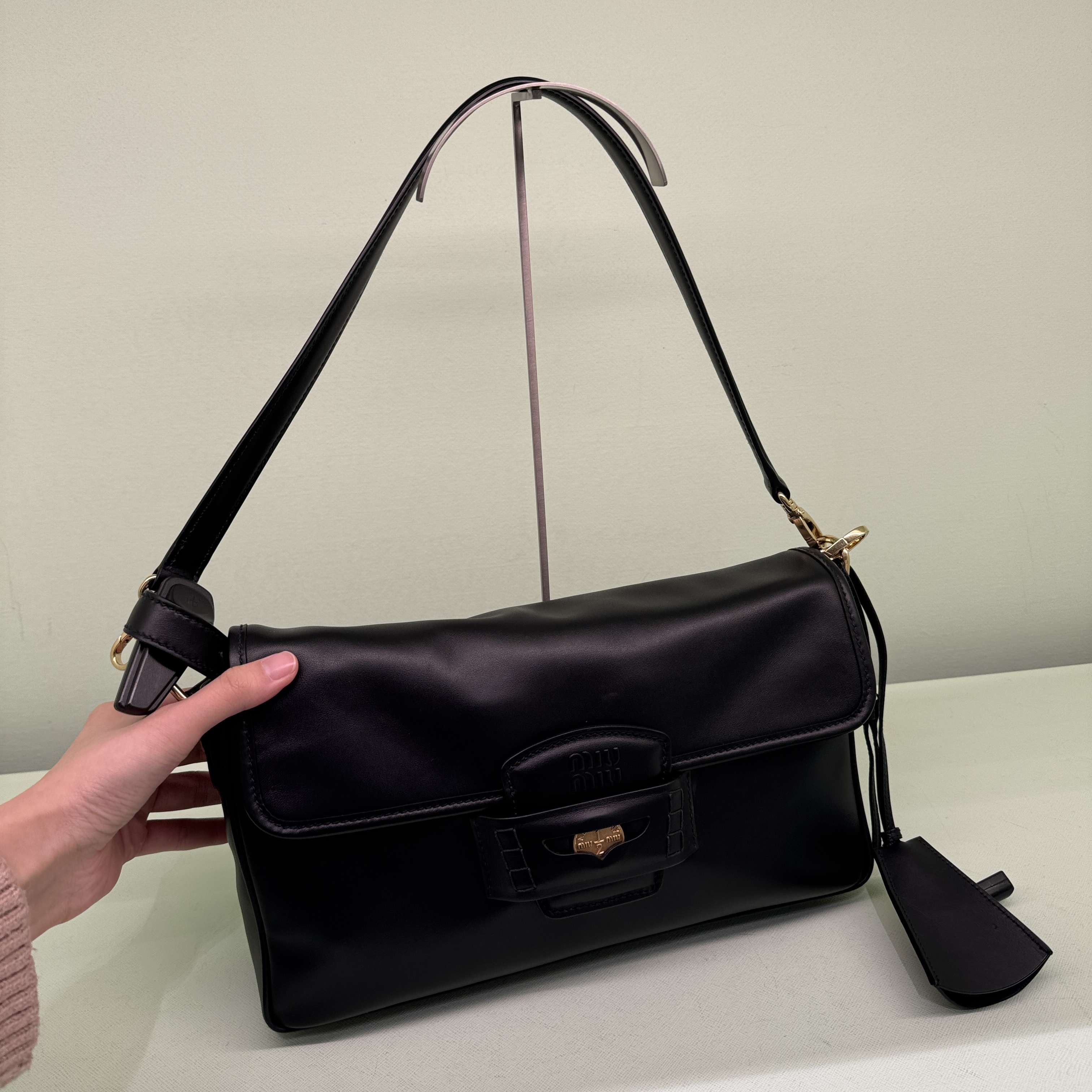 Miumiu Cognac leather penny small crossbody bag black 5BD270