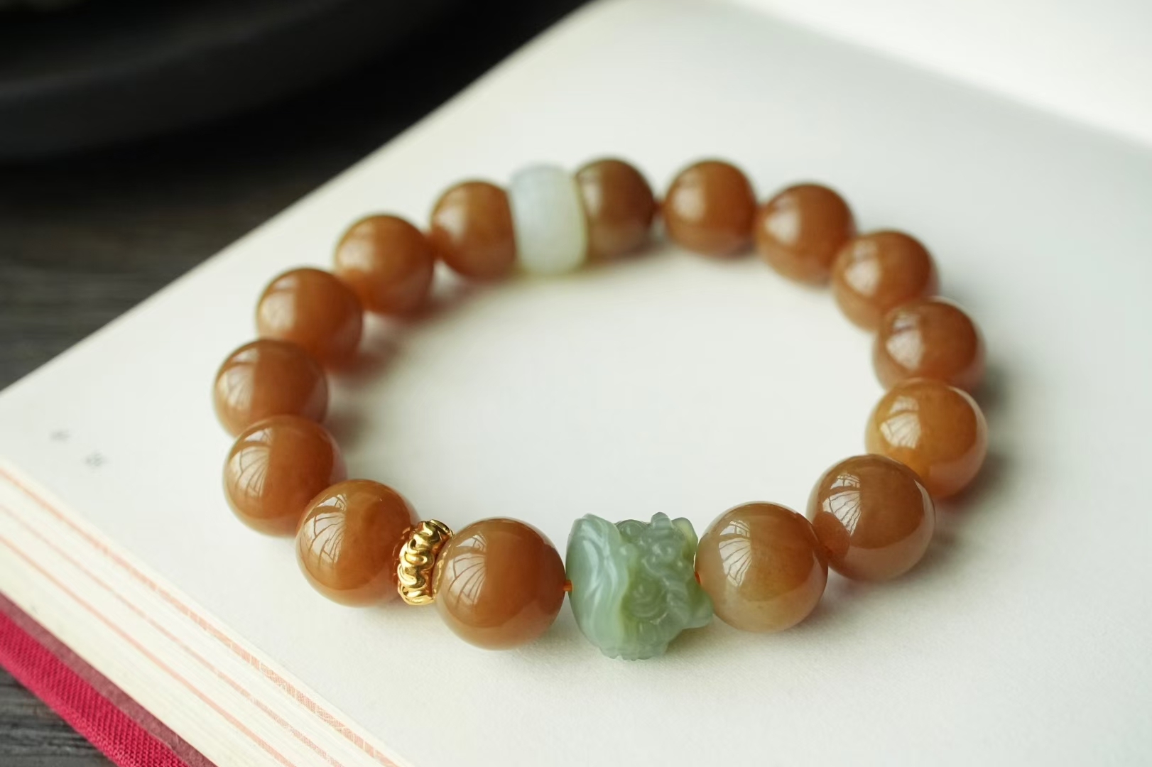 107424 和田玉新疆金山礦純糖料圓珠手串 (12mm直徑)