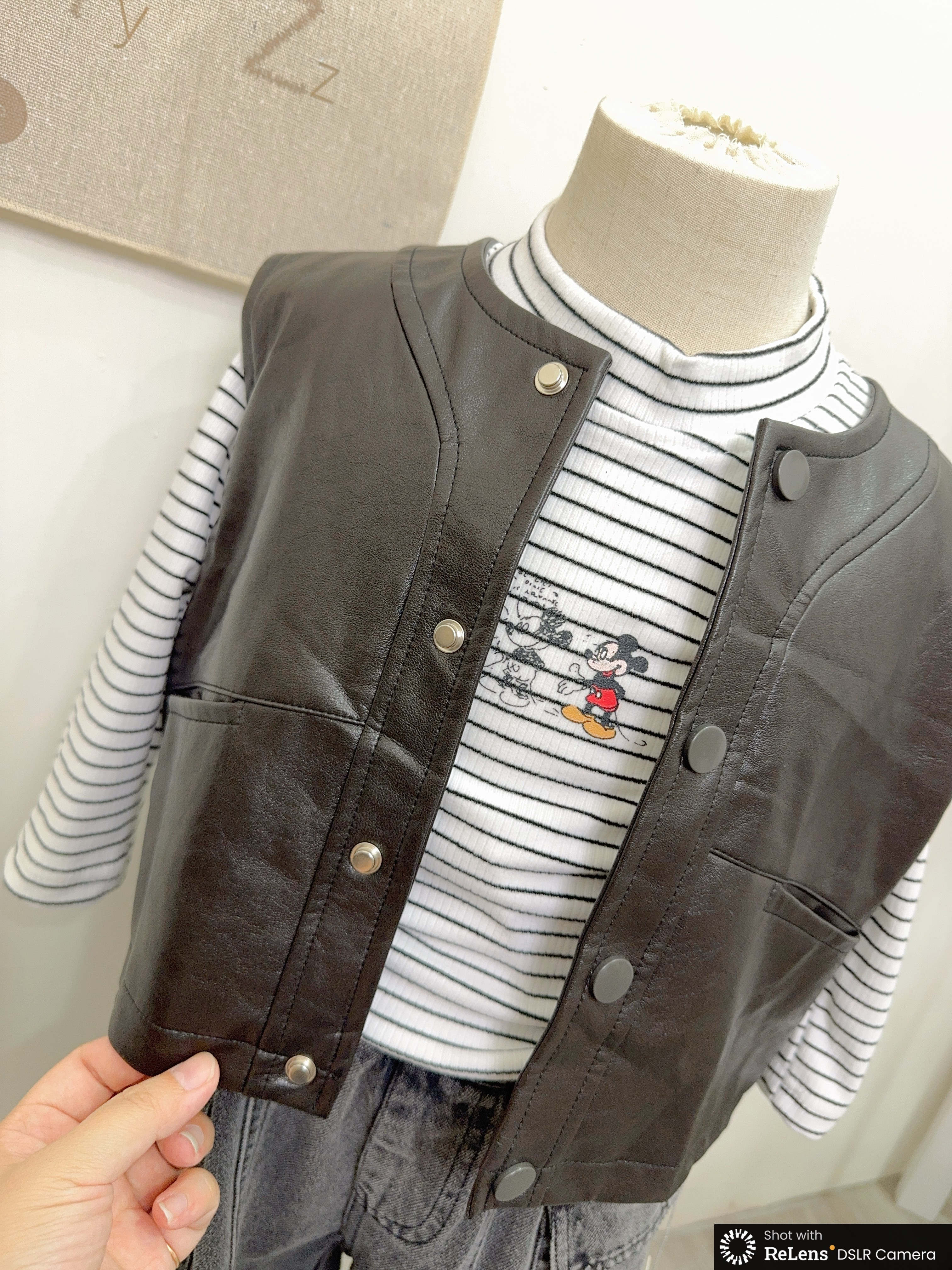 H5069後標籤皮背心c125