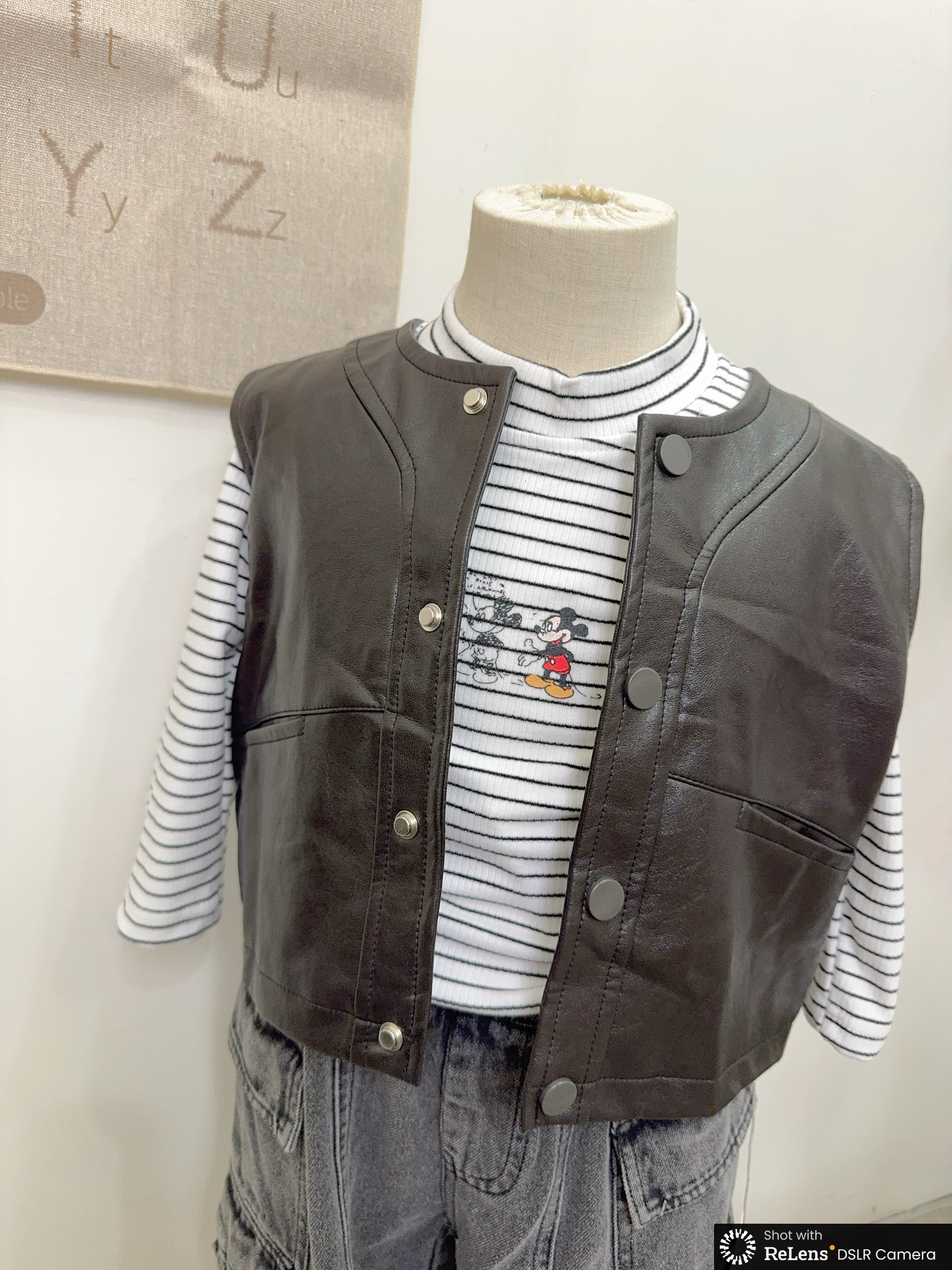 H5069後標籤皮背心c125