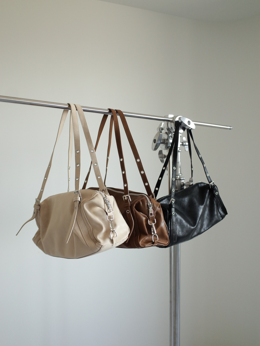 autumn-tone buckle strap baguette bag