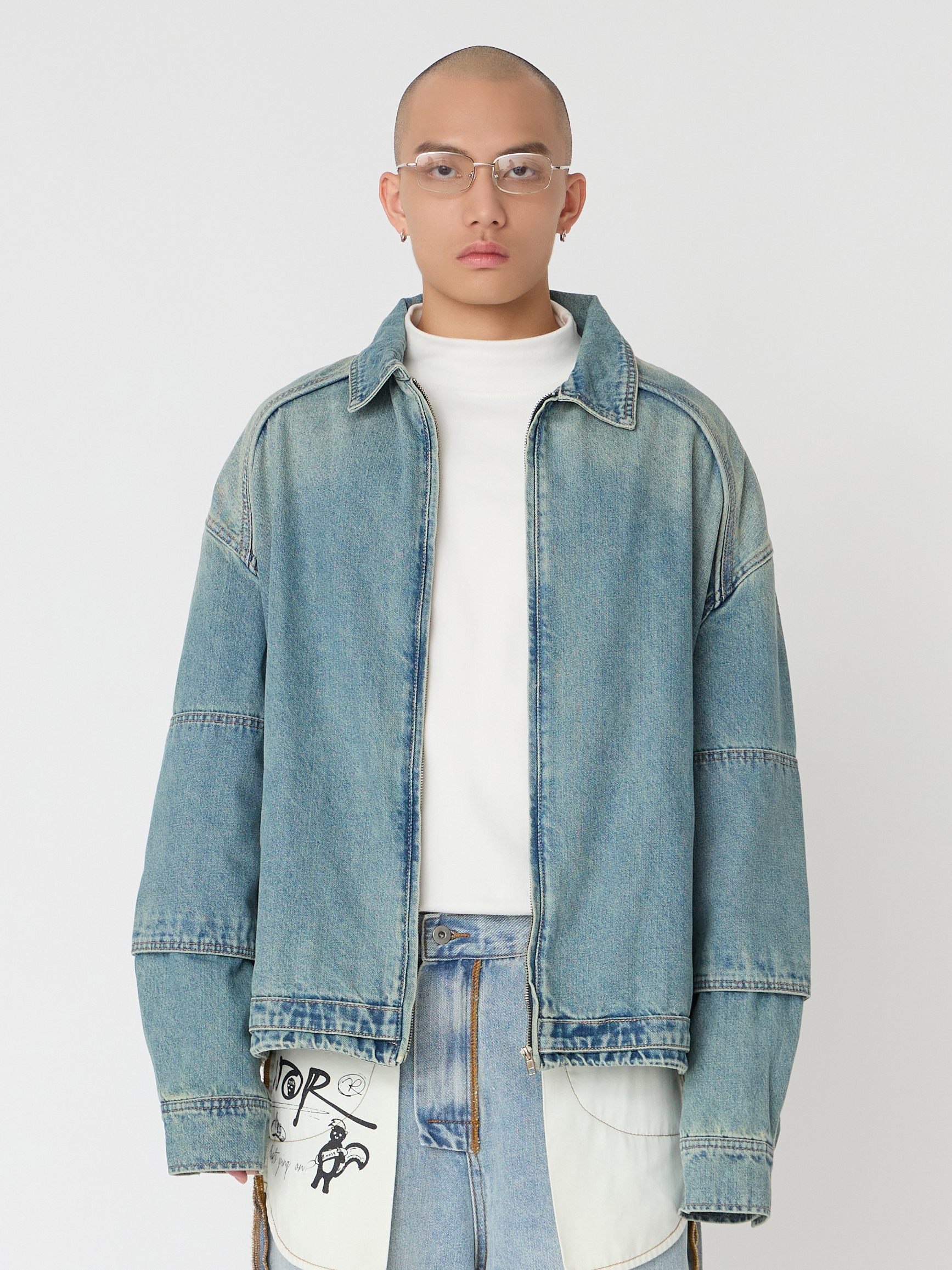 NOIR 插肩構型剪接牛仔外套