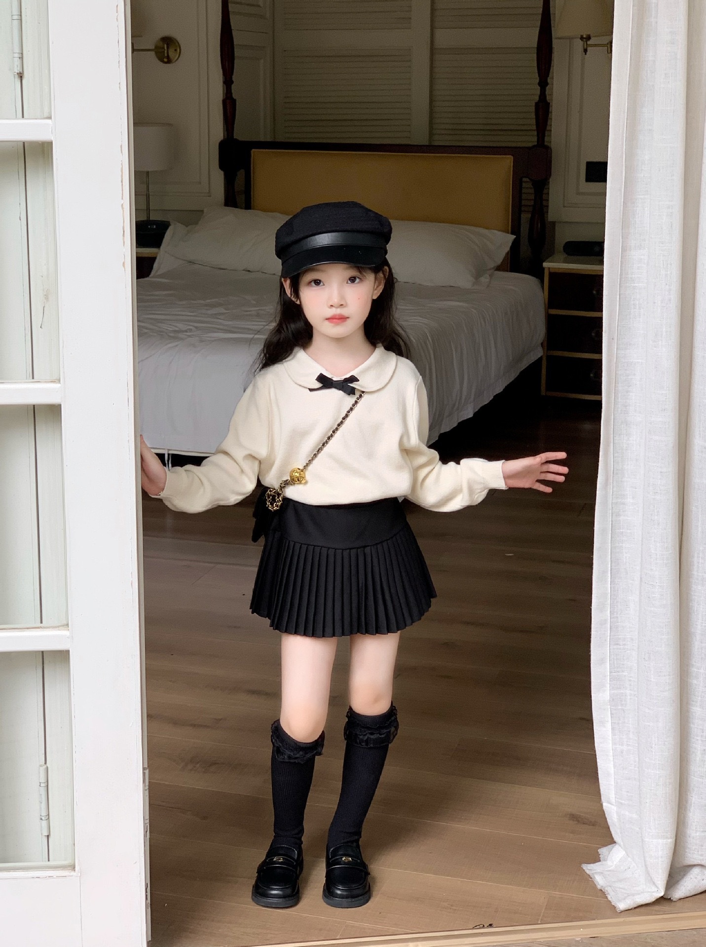 Miu感學院風針織上衣/黑色百褶裙