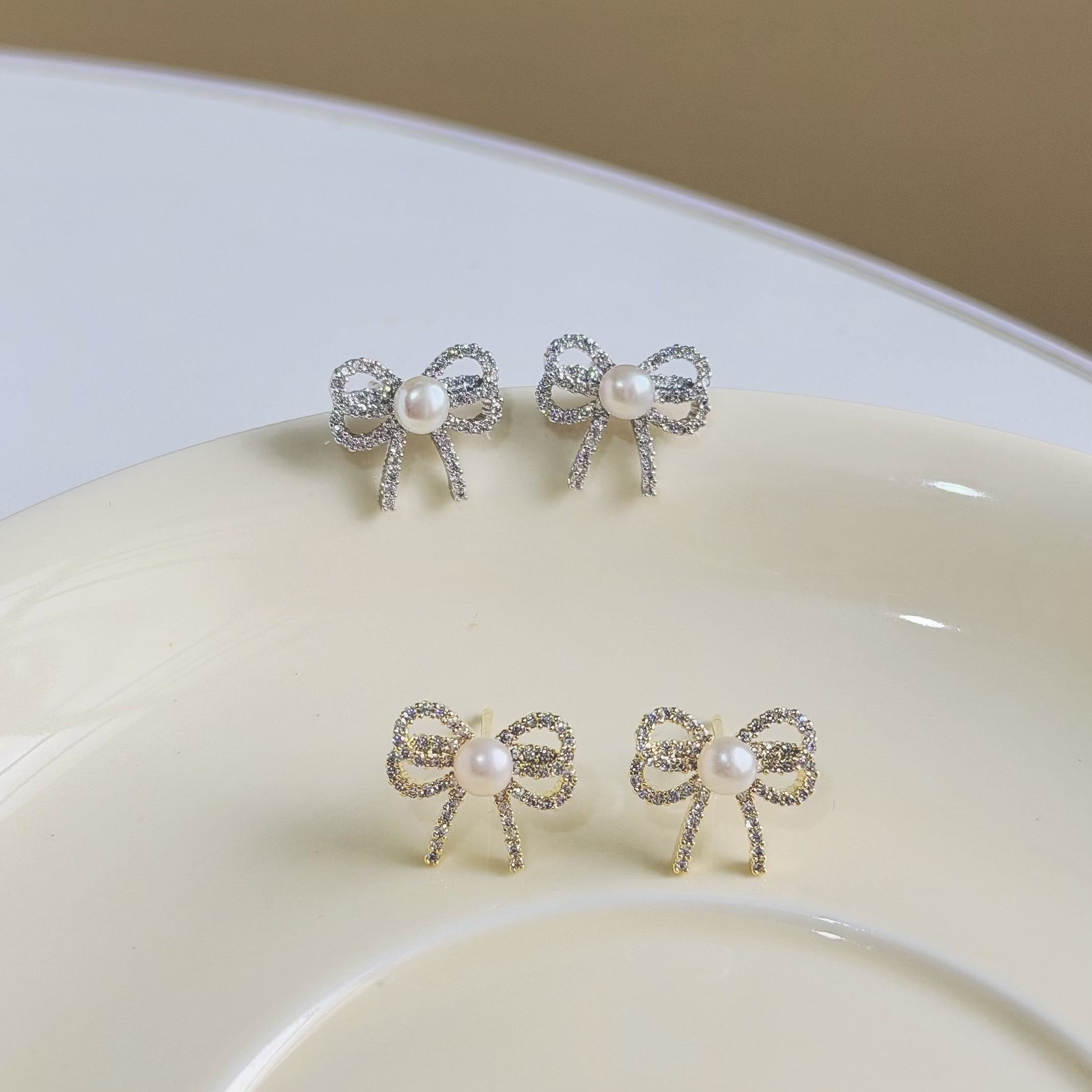 C201排鑽淡水珍珠蝴蝶結耳針