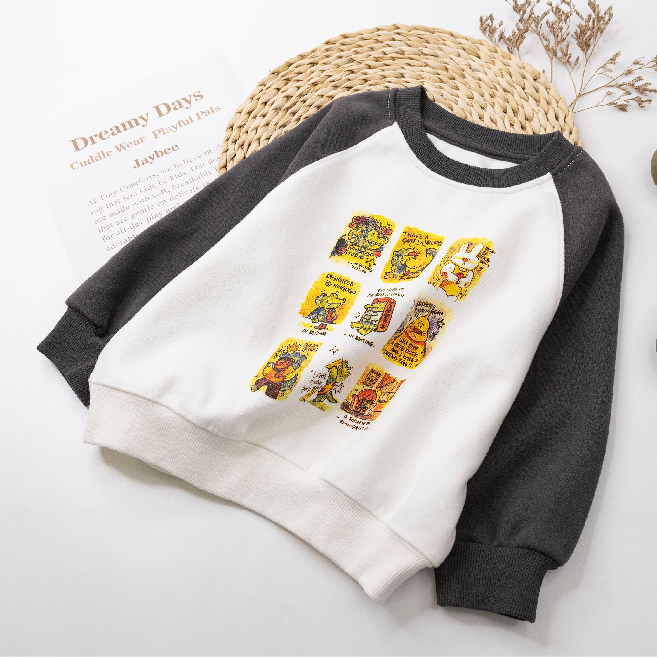 【H55064】漫畫九宮格撞袖拼接上衣