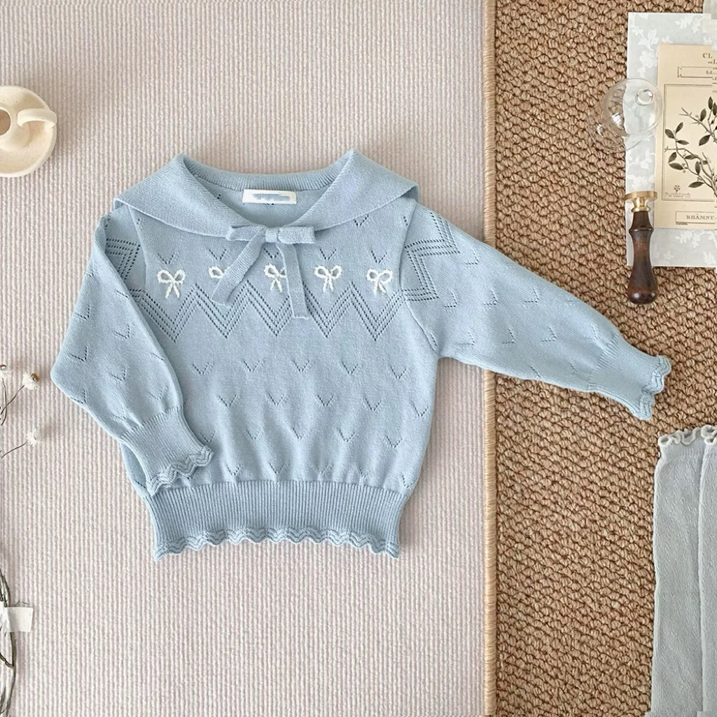 HCB10T002BL 天空藍鏤空蝴蝶結針織衫