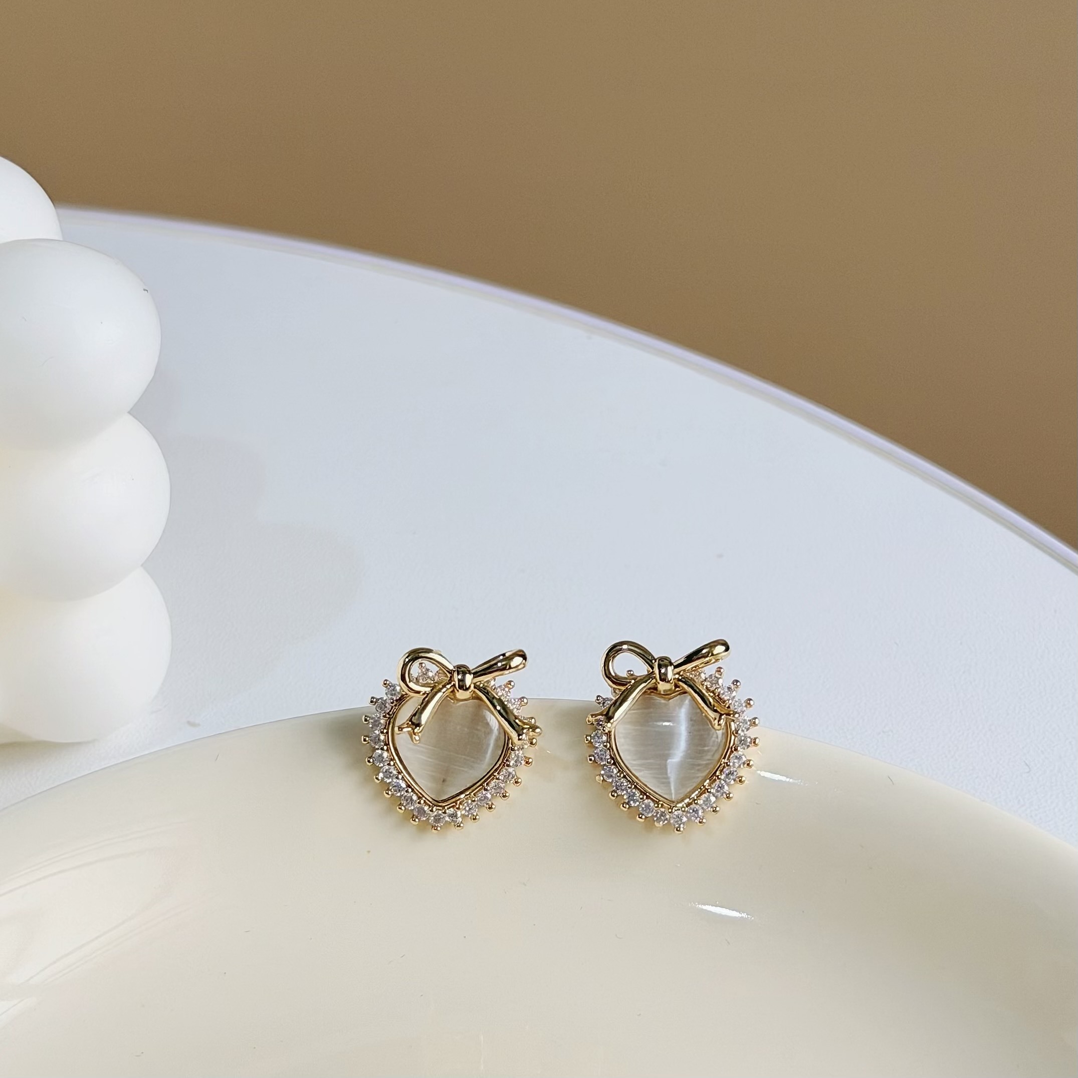 C192排鑽貓眼蝴蝶結愛心耳針