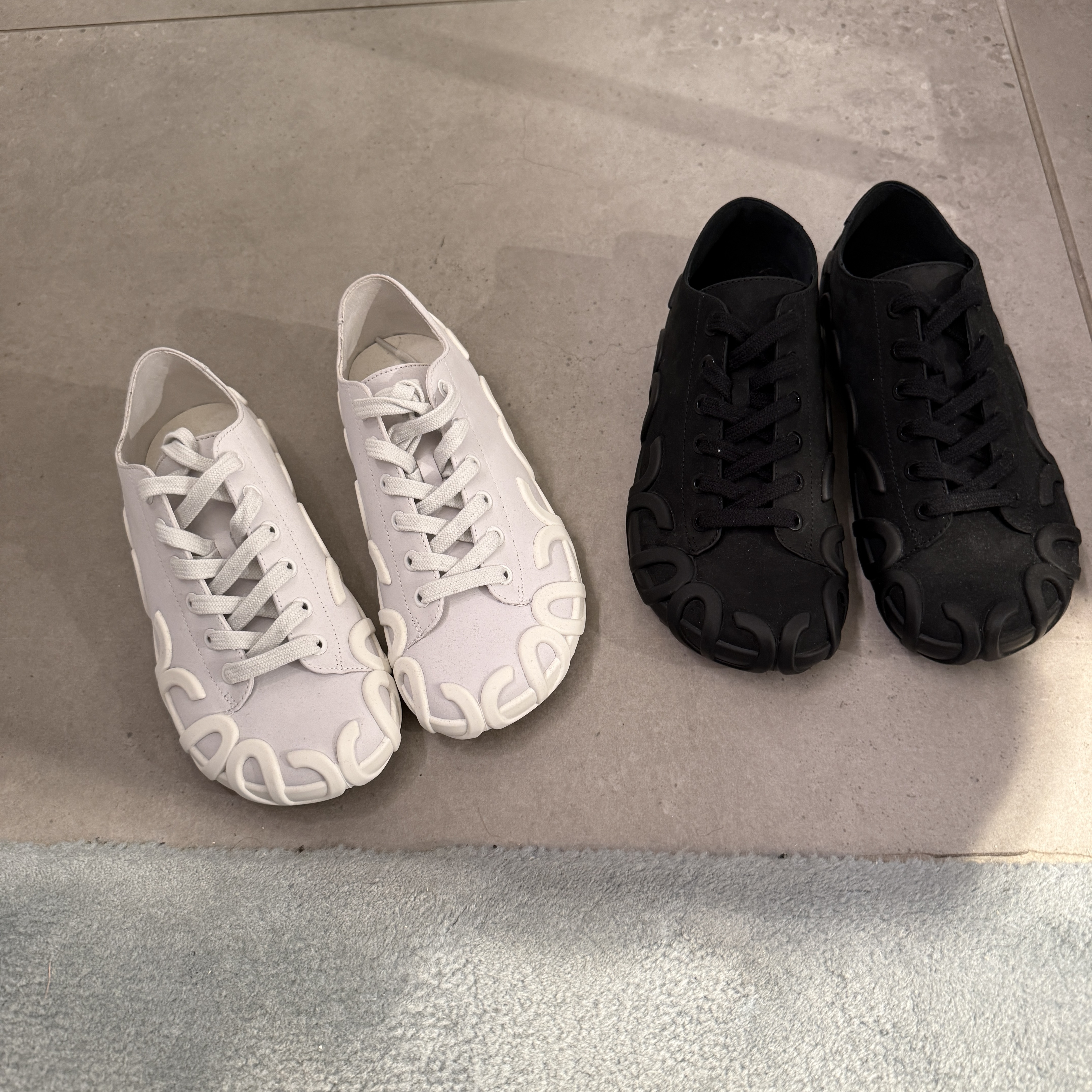 Loewe Rise Lace up Sneakers black and white