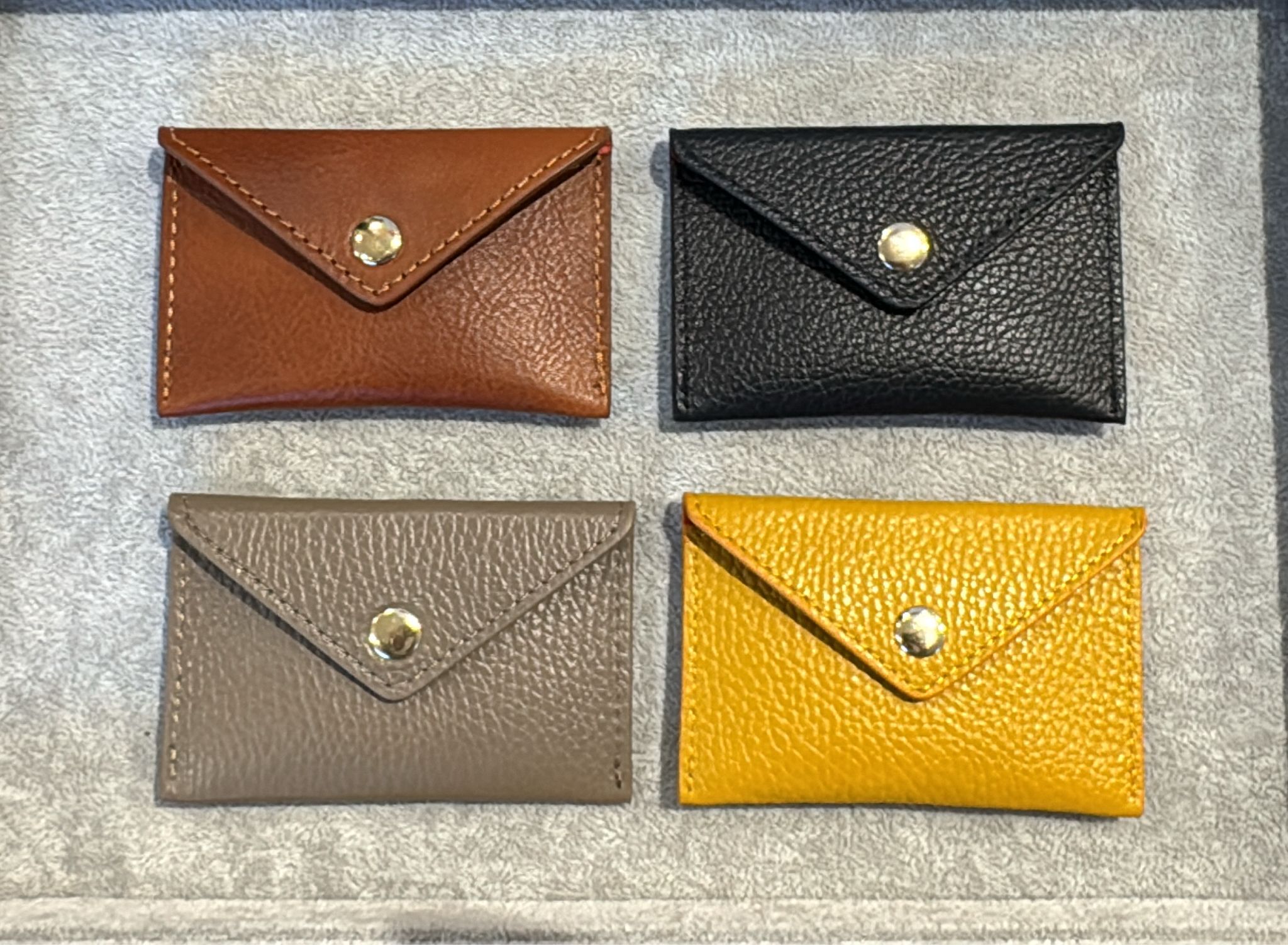 【直播】意大利皮具 LL102640 鈕扣散紙包