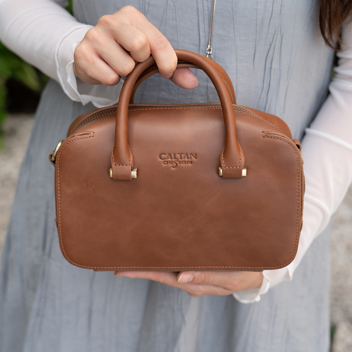 Belle Arc立體真皮萬用包-234079ht