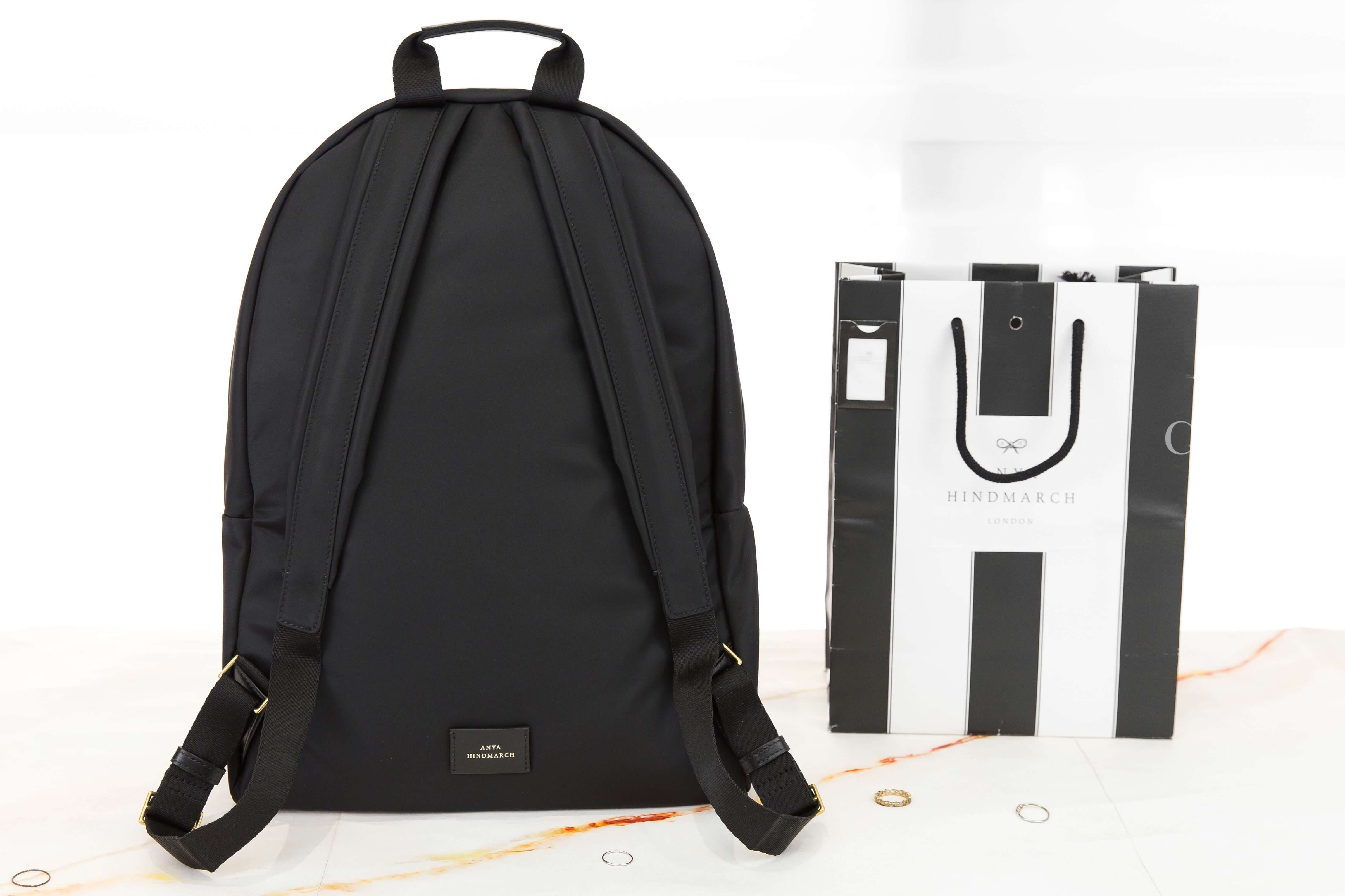 Anya Hindmarch Eyes Backpack 黑色再生尼龍白色牛皮眼睛紅色內裡黑色流蘇金色拉鍊大型手提後背包-Charline Boutique 精品代購