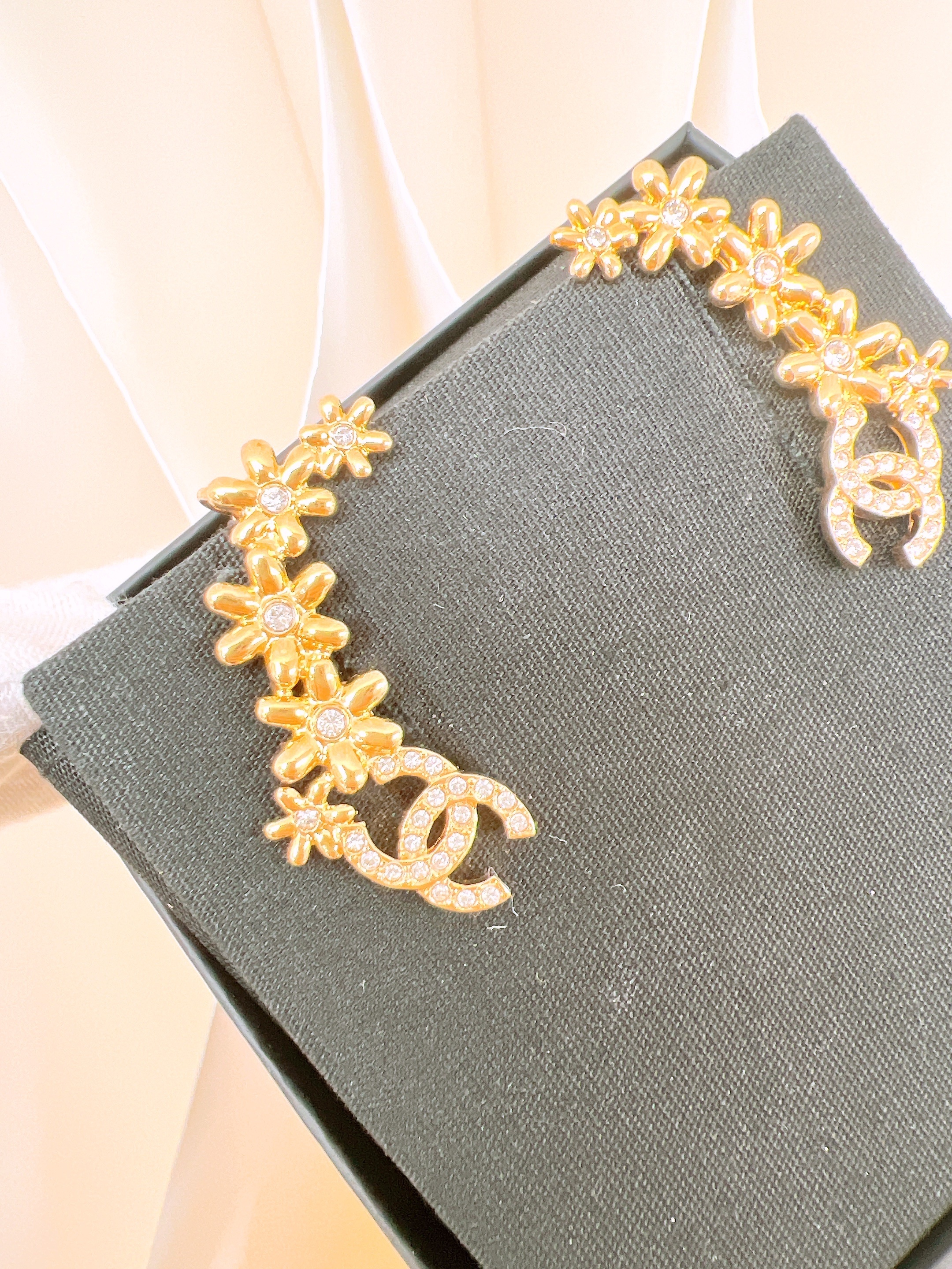 Chanel 23k flower earrings