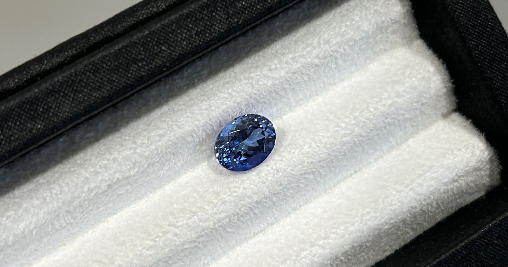 A 2.30ct vivid violetish blue oval-cut tanzanite.