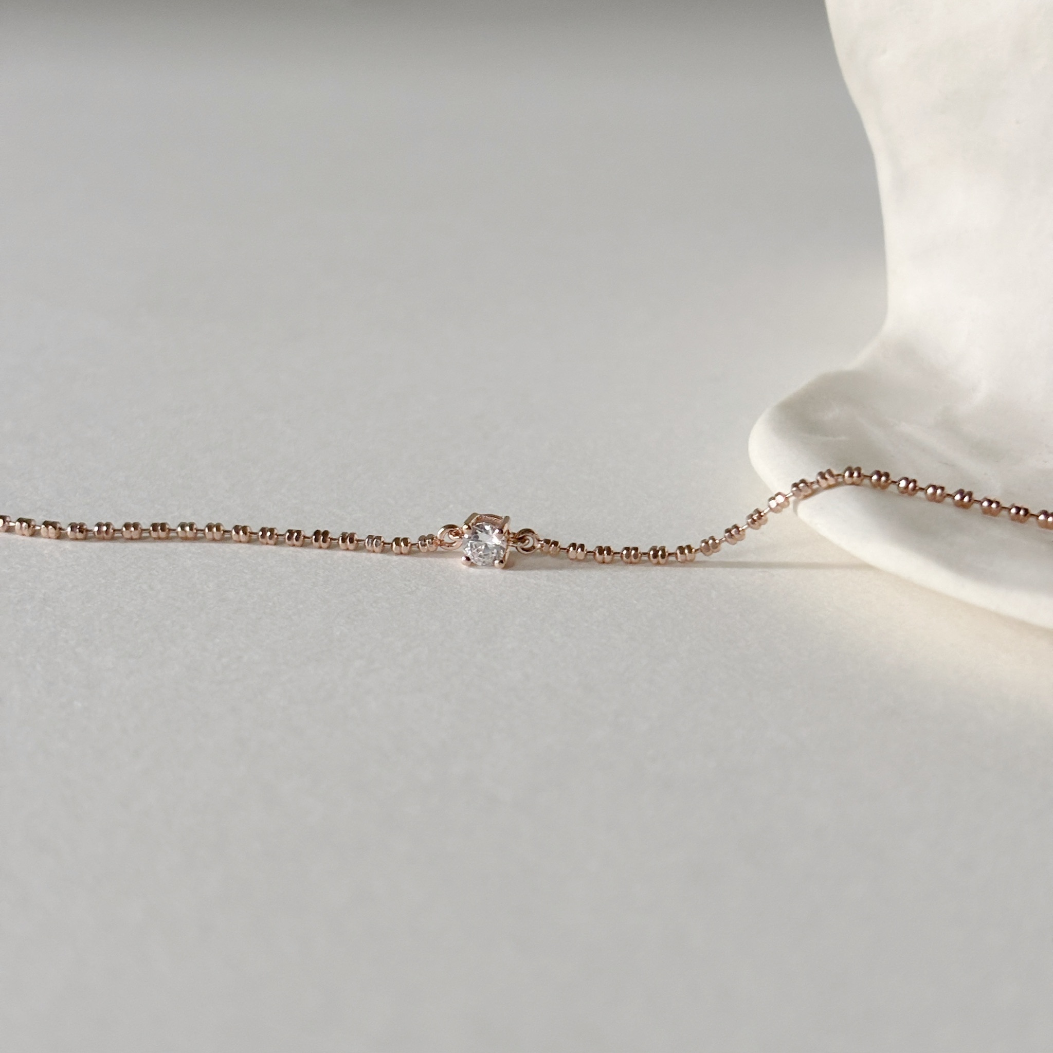 經典四爪鋯石節節手鏈