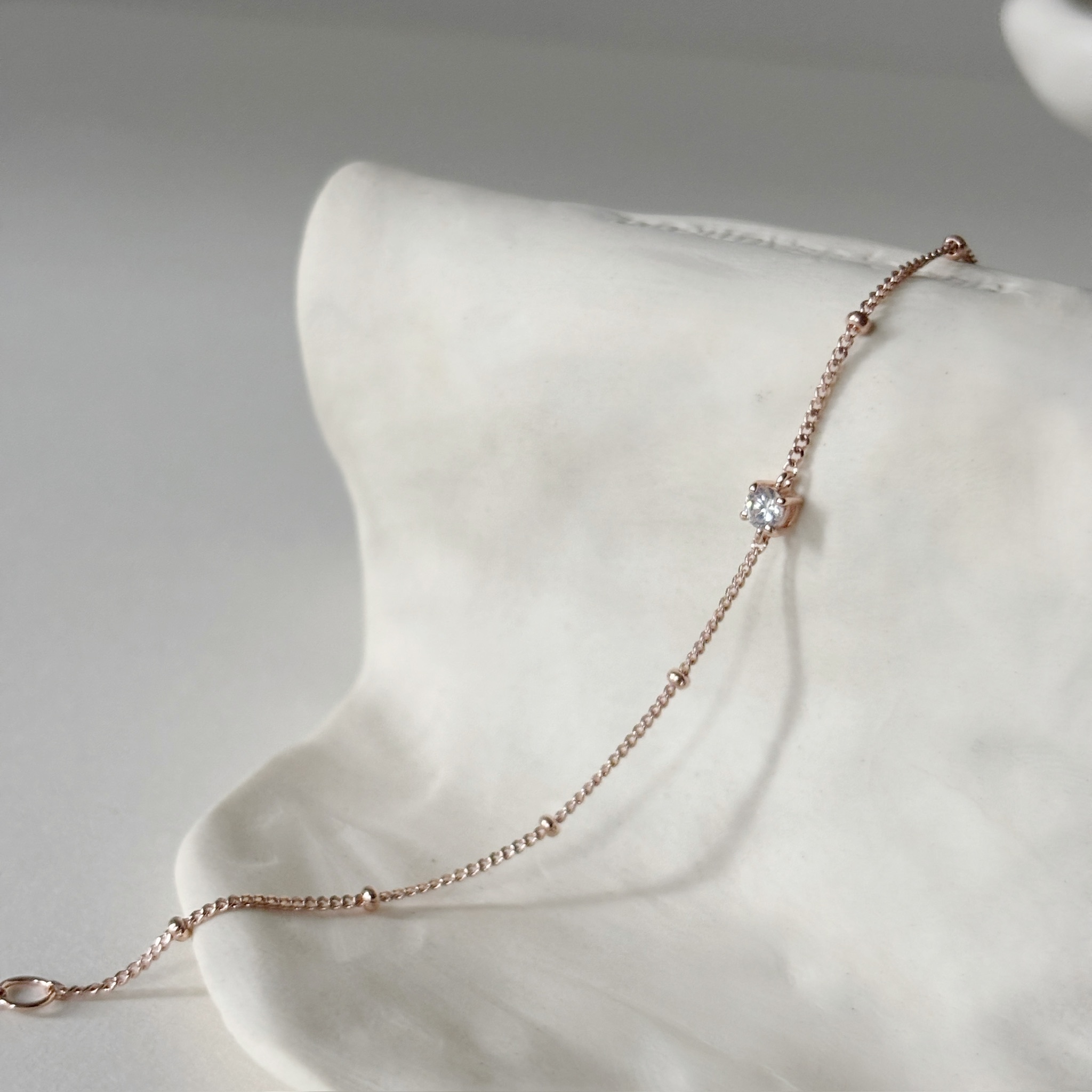 經典四爪鋯石細珠手鏈