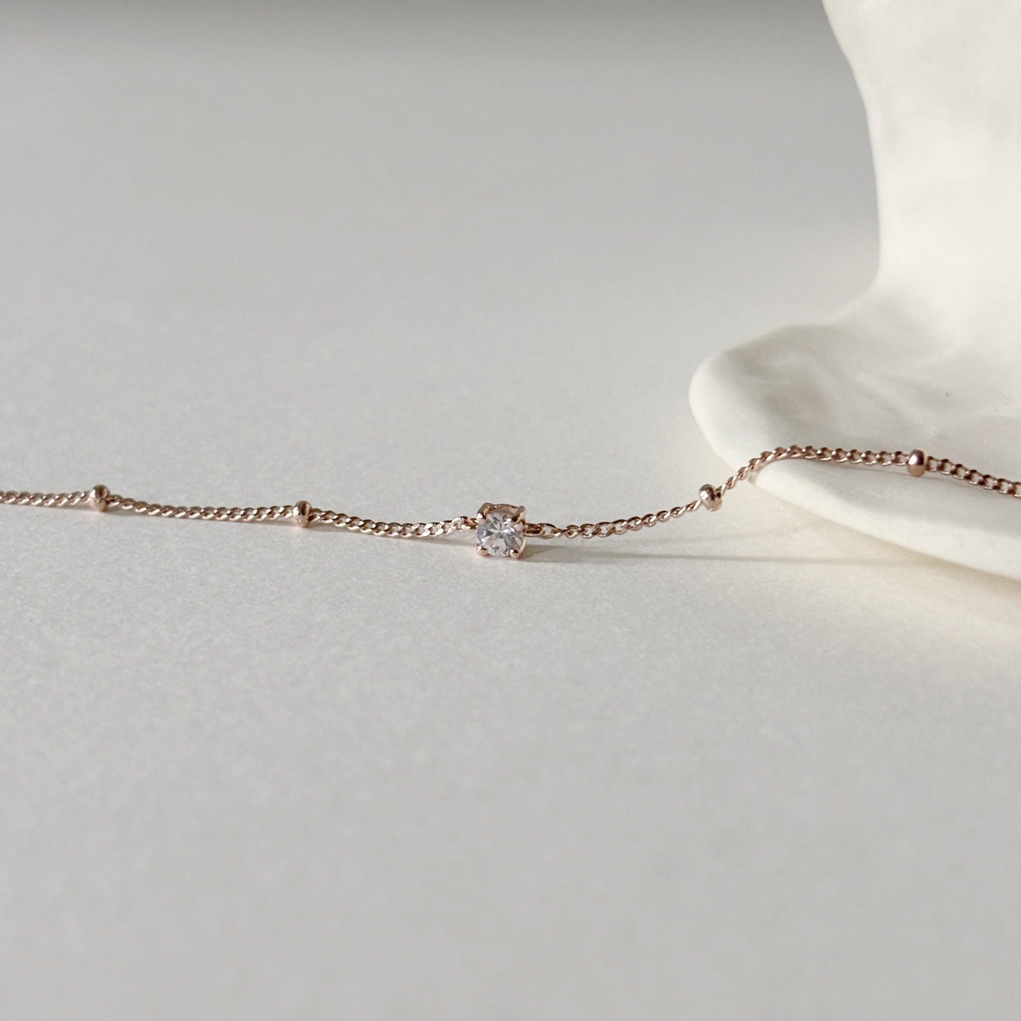 經典四爪鋯石細珠手鏈