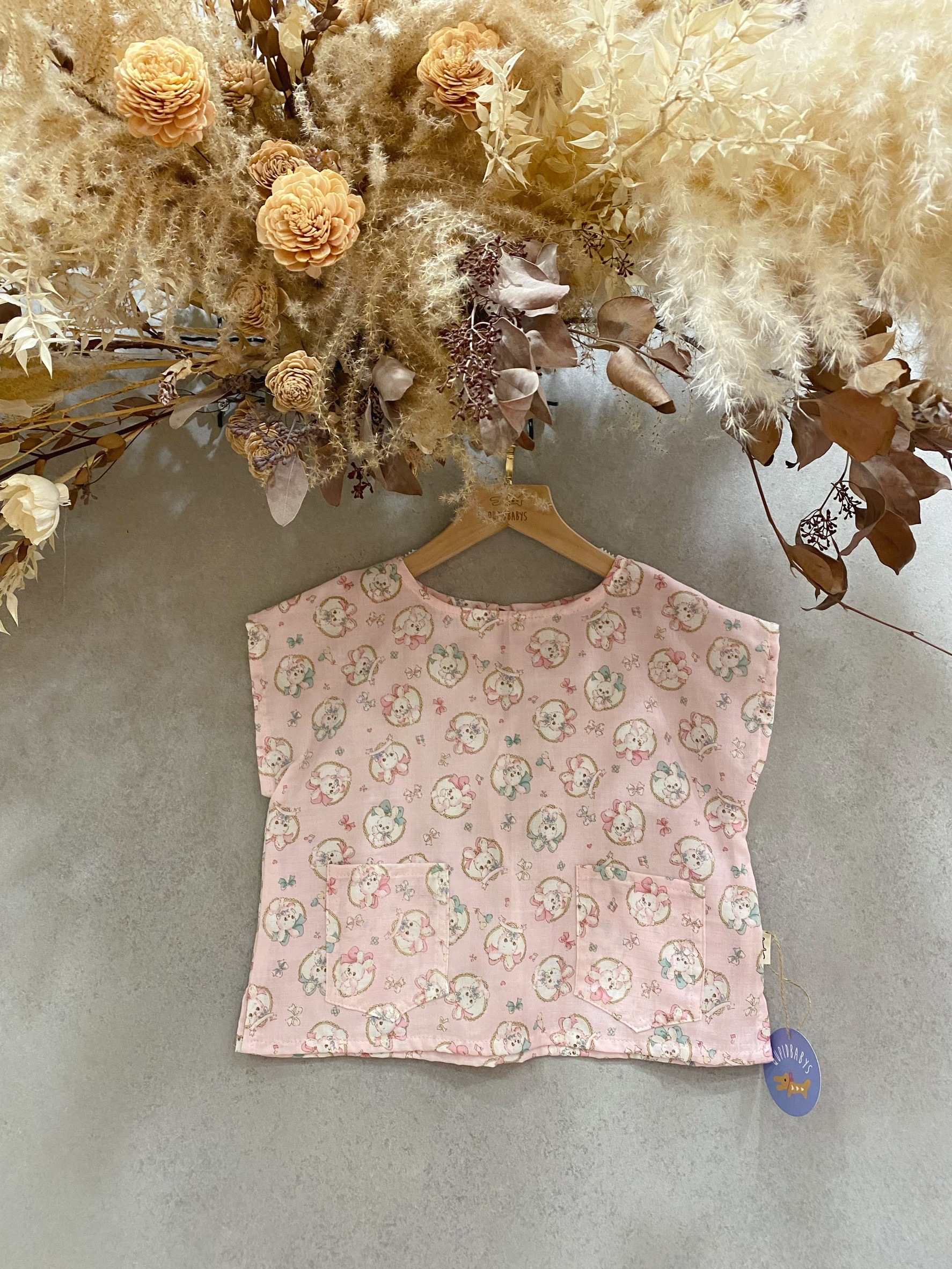 粉紅蝴蝶結兔兔 落肩上衣（110）