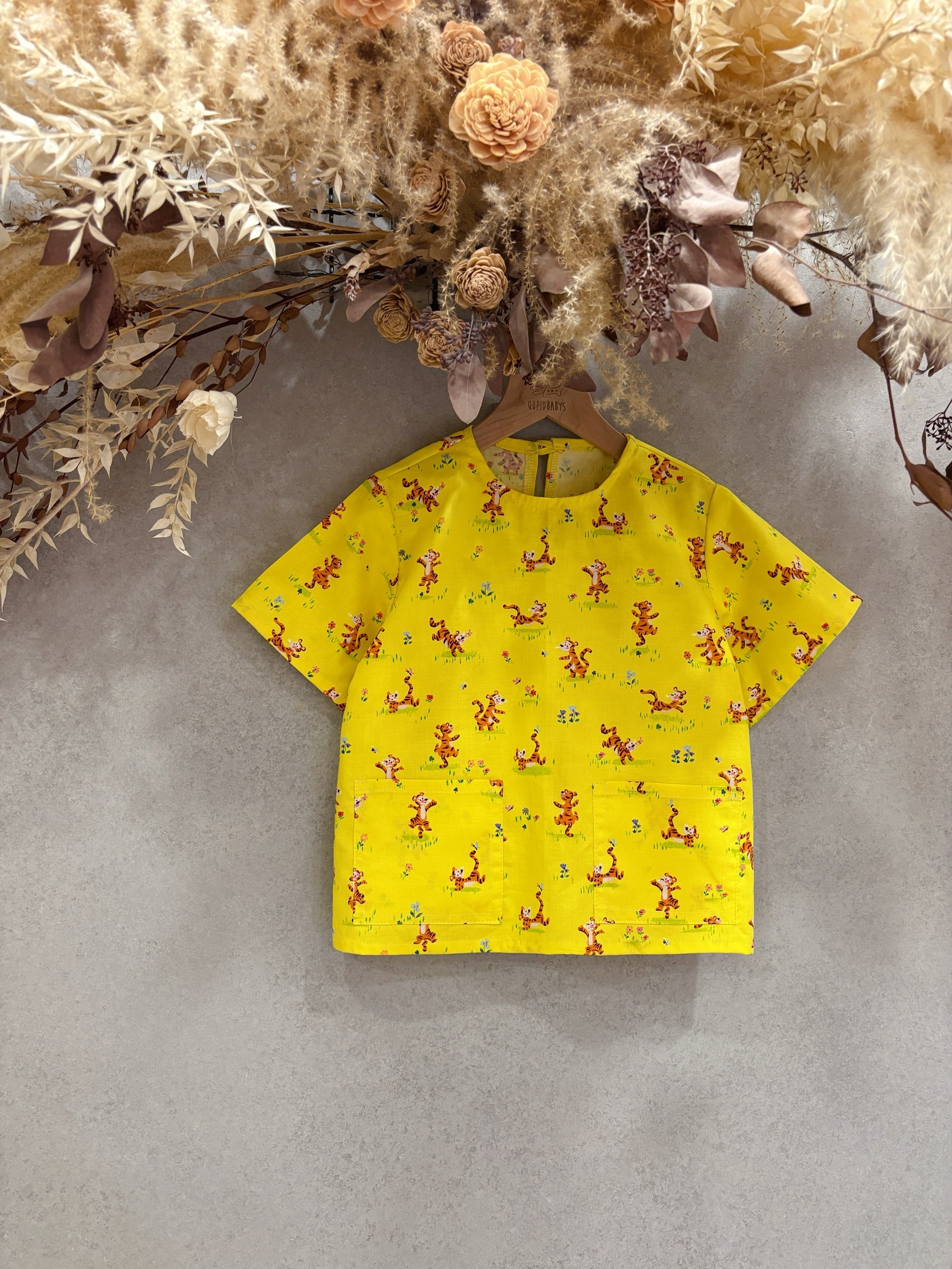 黃跳跳虎 口袋短袖上衣（110）